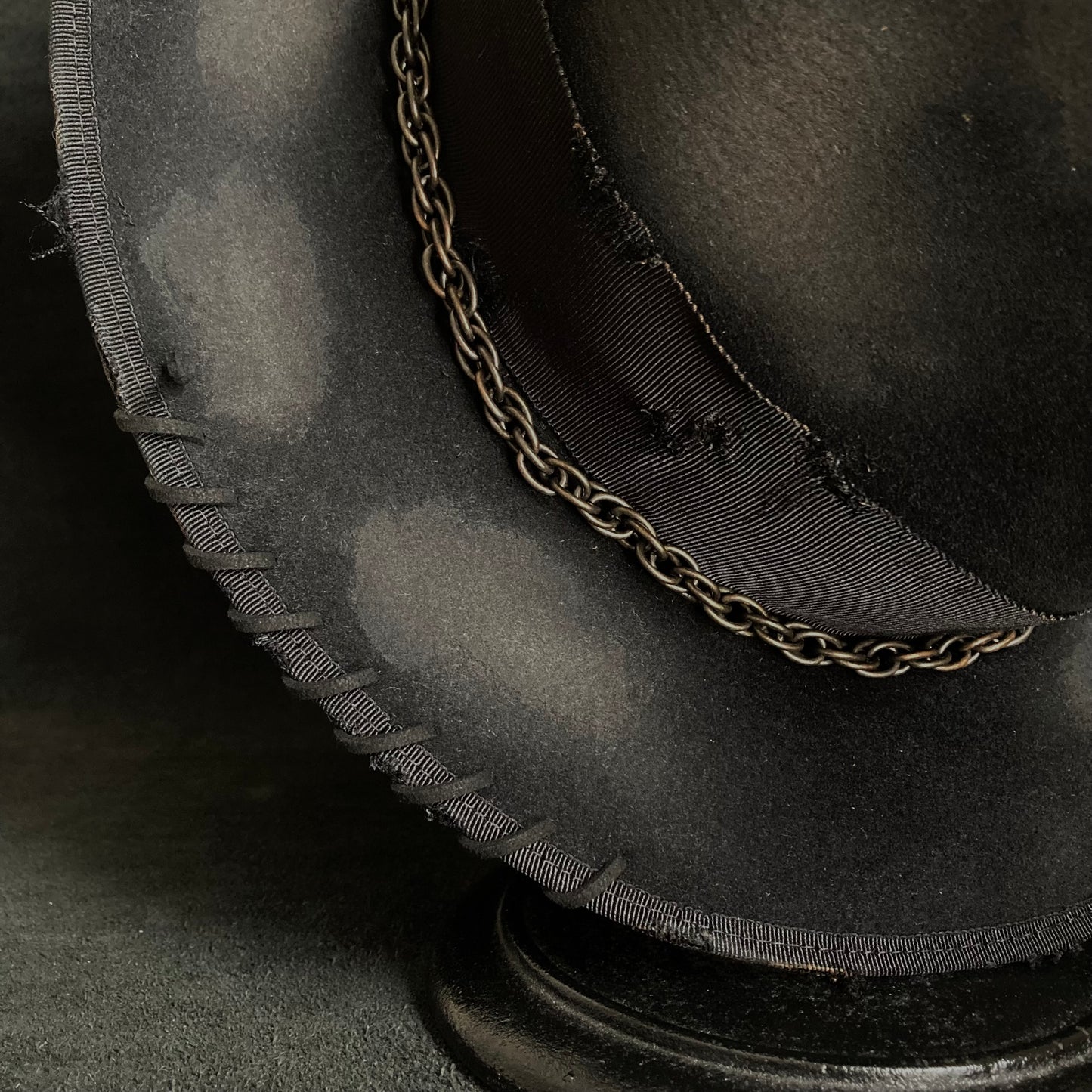 Eyelet burned hi-fedora hat