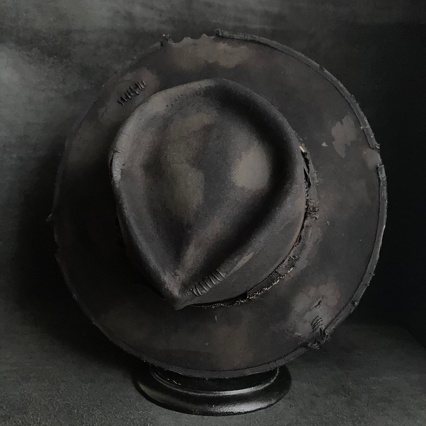 Damaged black rabbit fedora