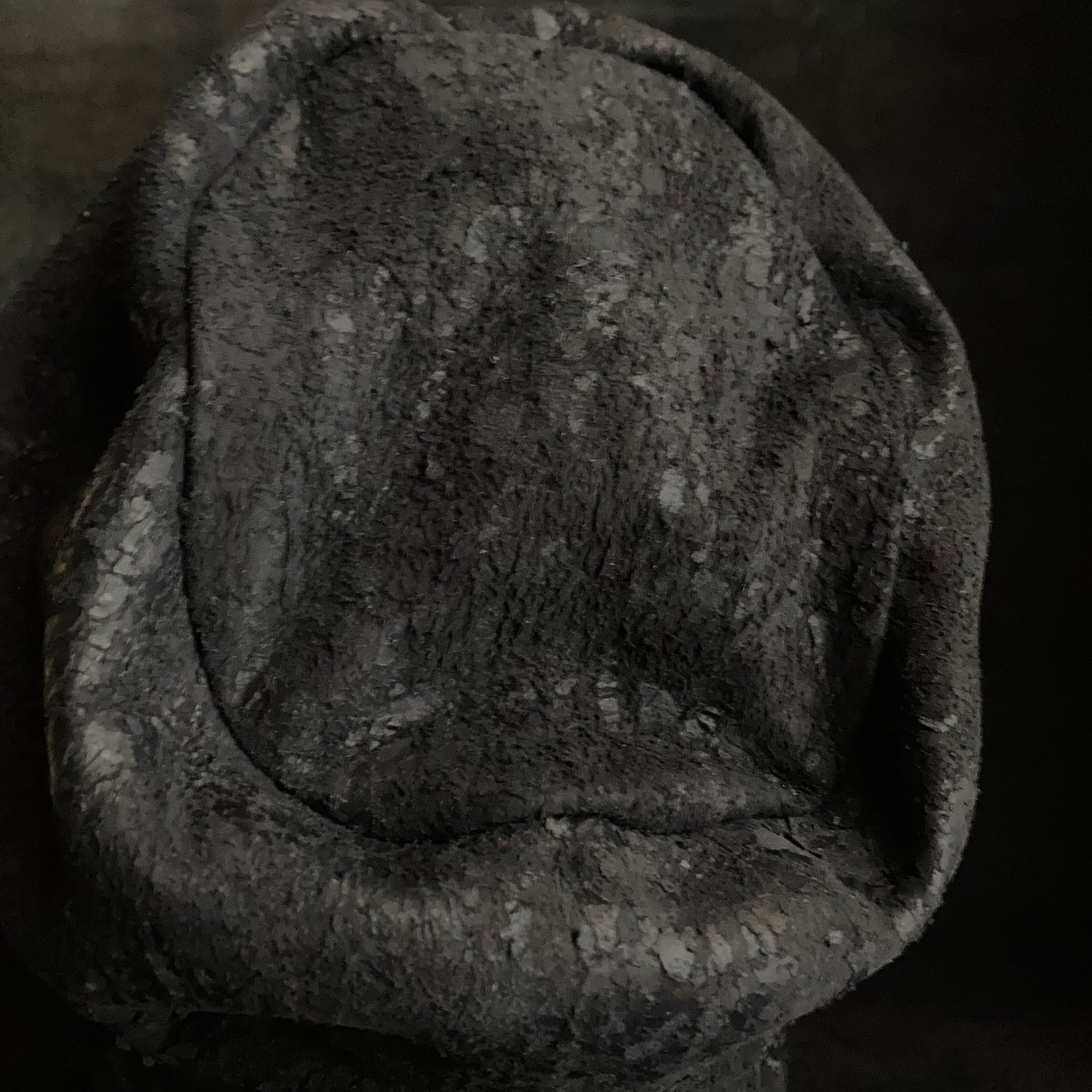 Scrape black leather turn cap