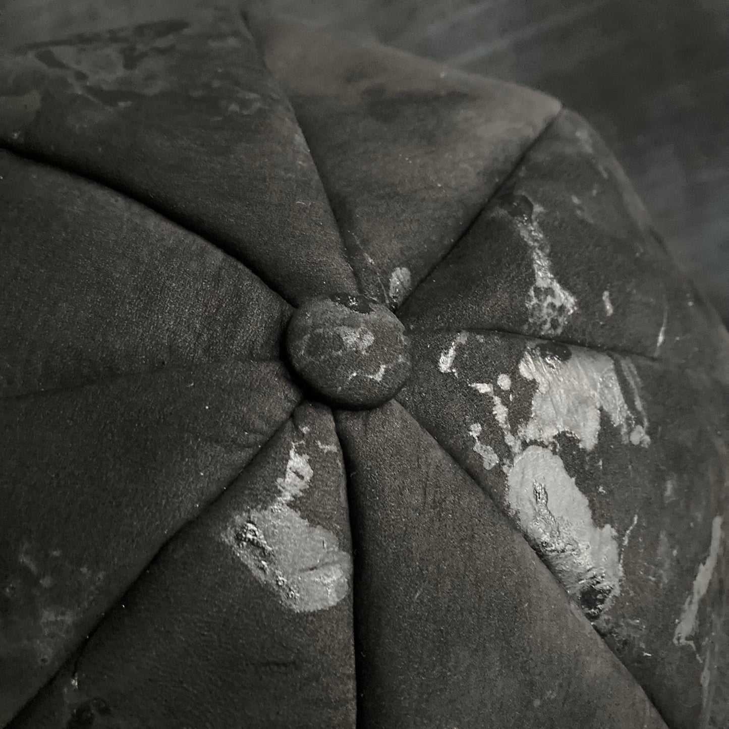 Paint stains black leather casquette