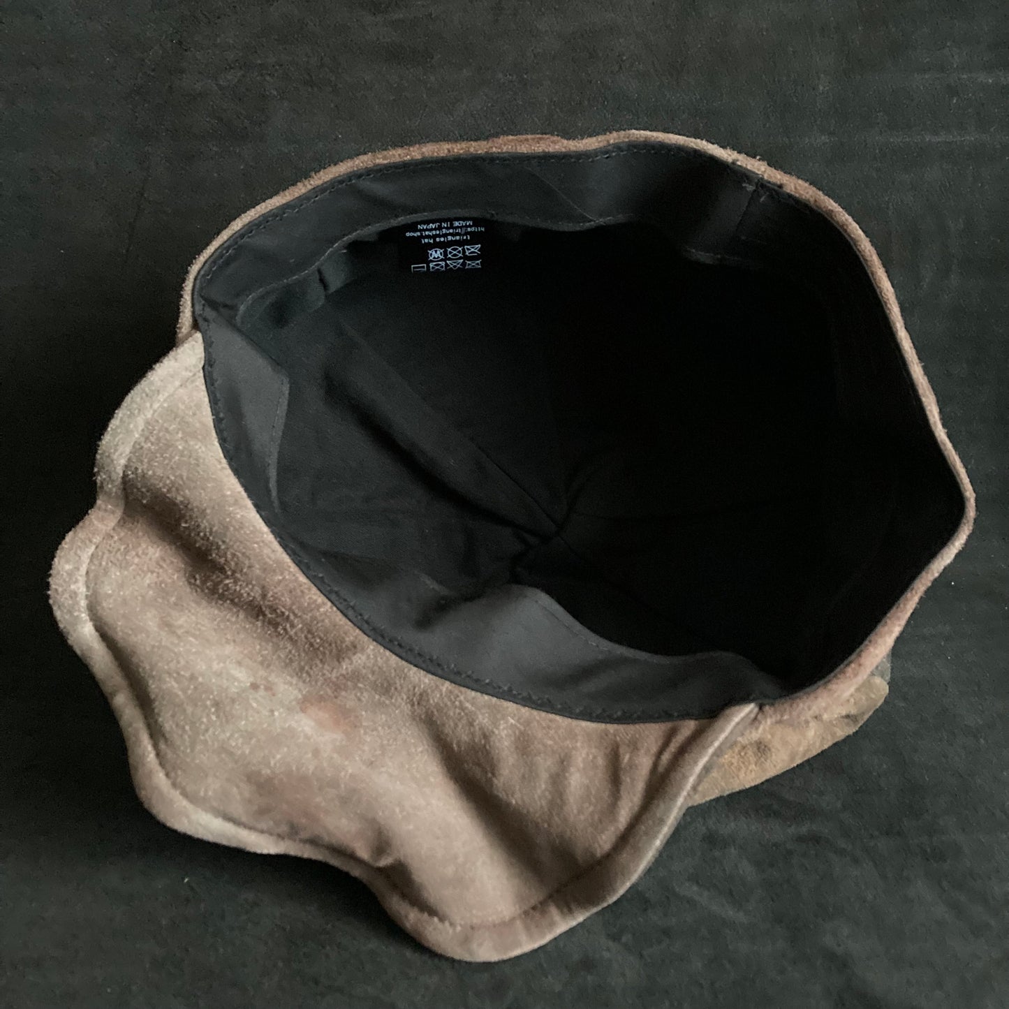 Each individual brown leather casquette