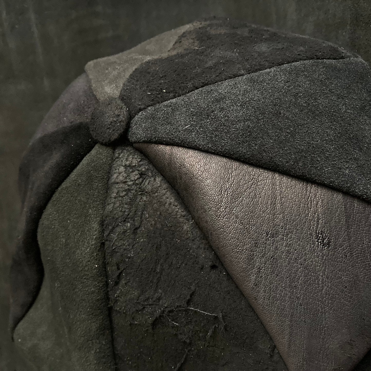 Each individual black leather casquette