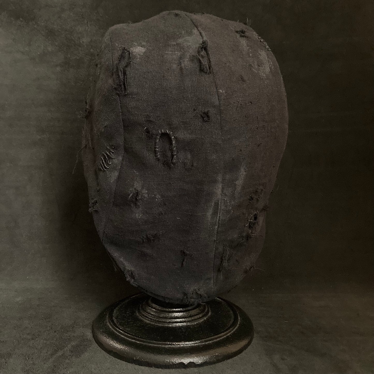 Damaged black linen hunting