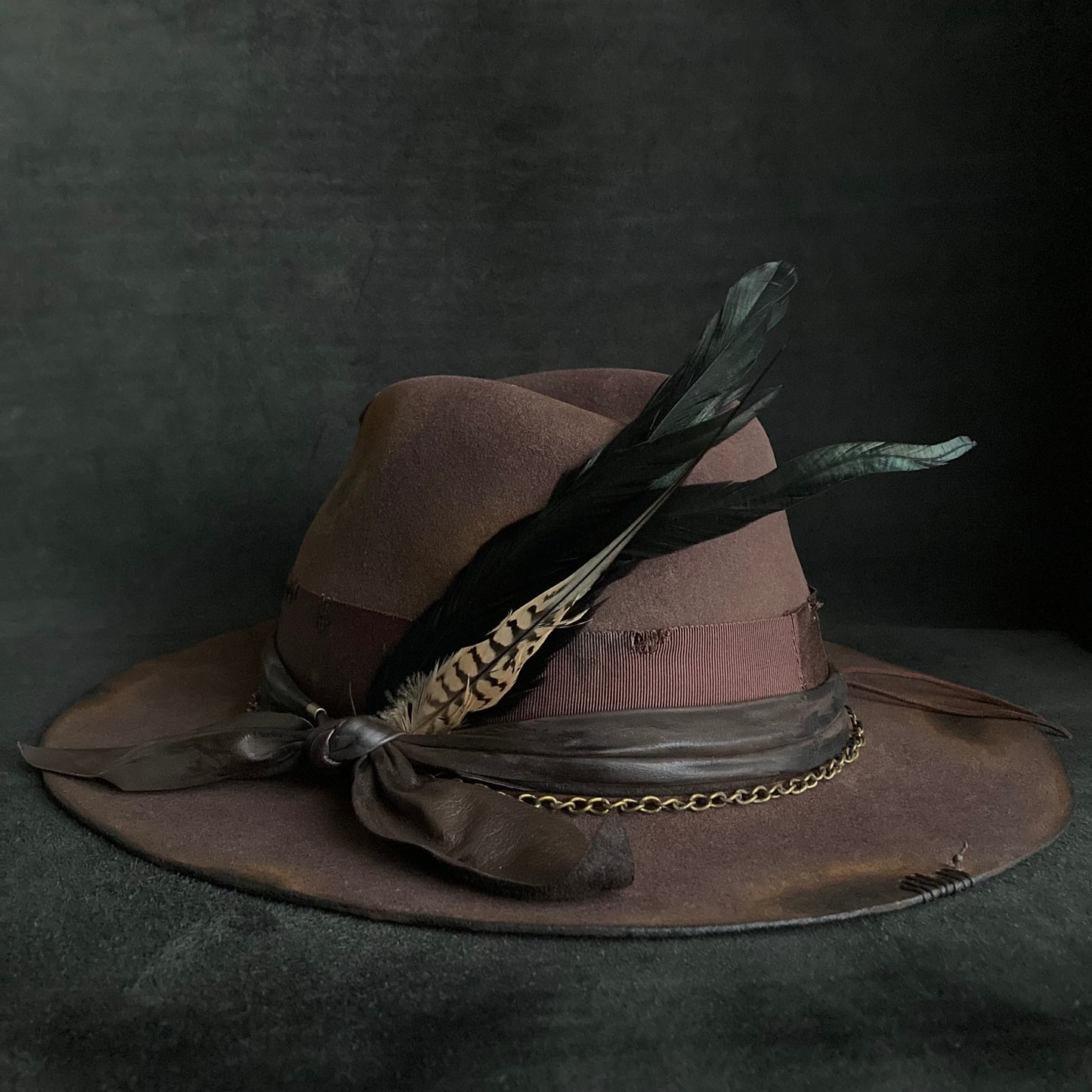 Burned brown dark feather fedora hat