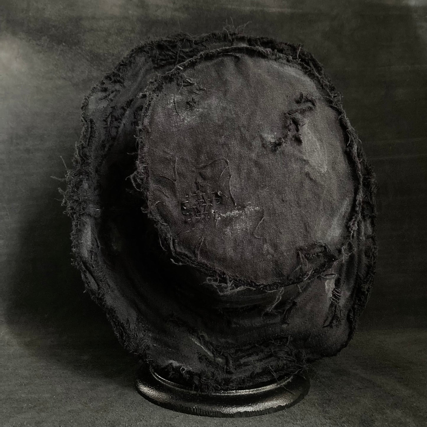 Back side black linen damage bucket hat