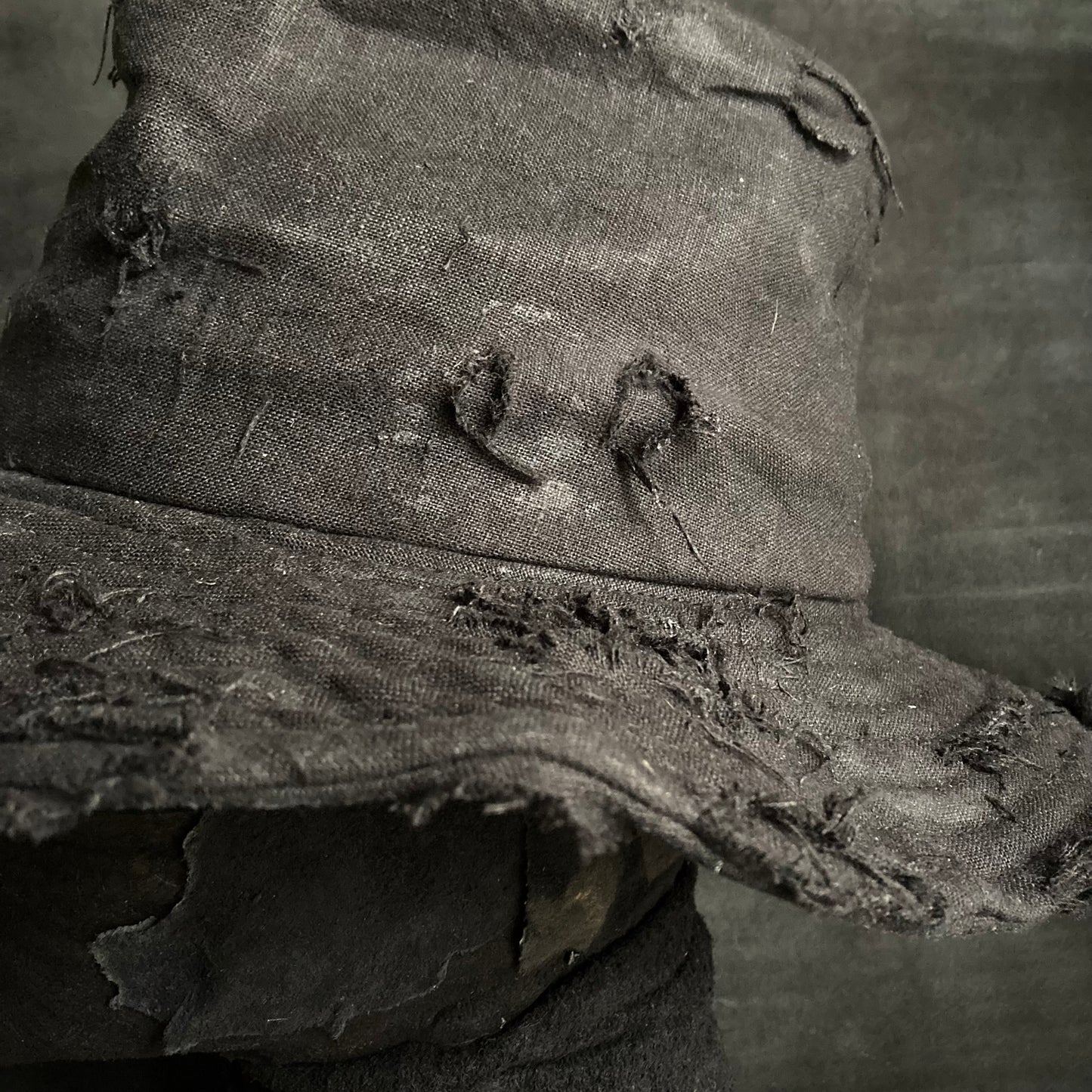 Black linen damage  fedora hat