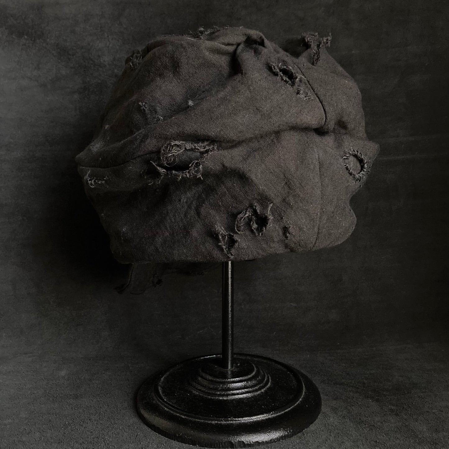 Thin black linen tattered turn cap