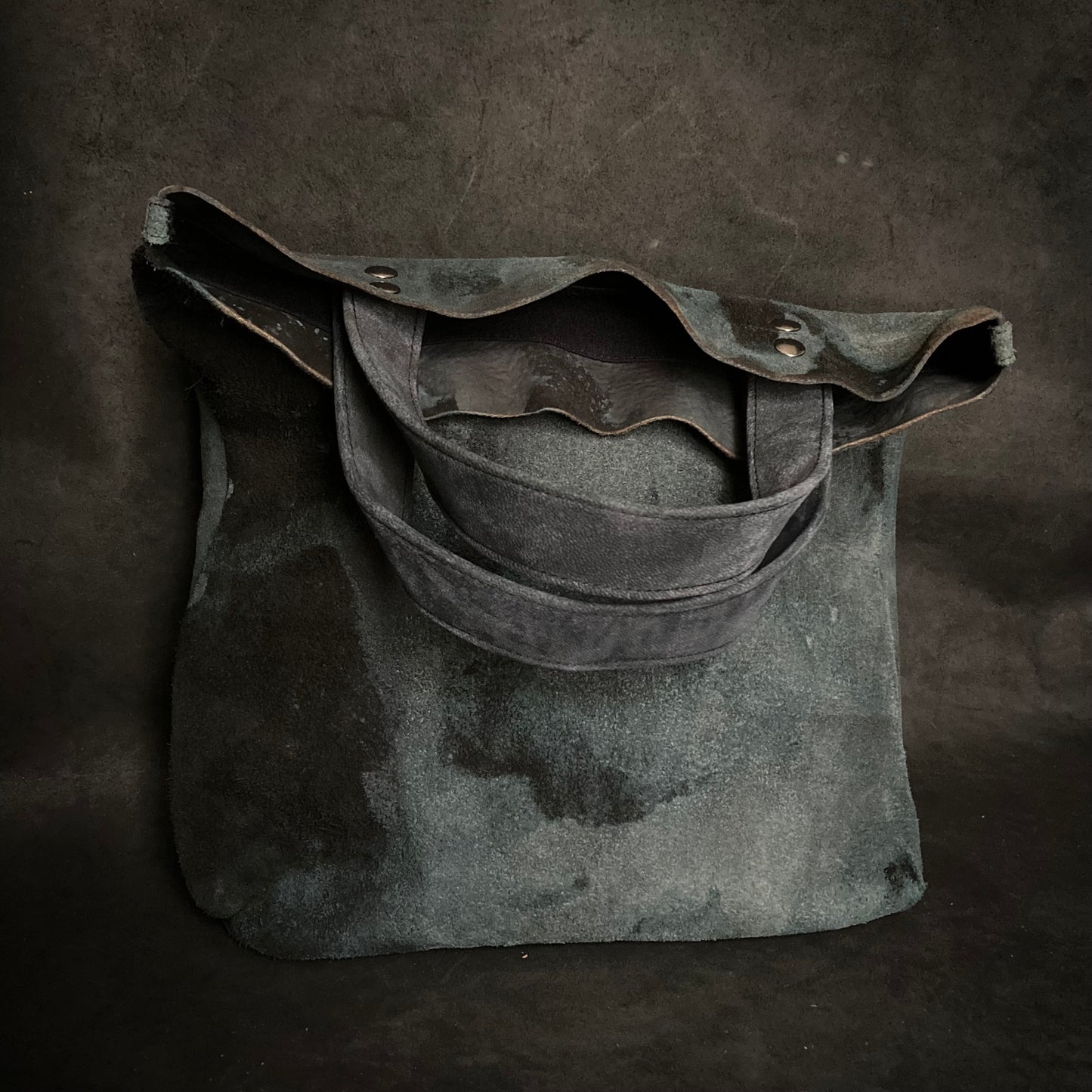 Bleached pale blue black leather tote bag