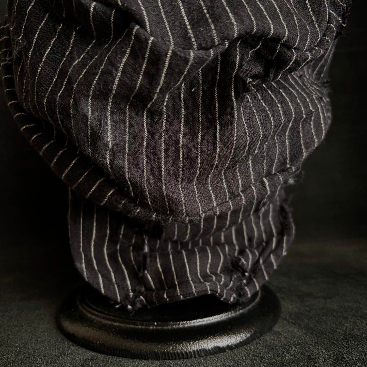 Yarn-dyed stripe damage turn cap