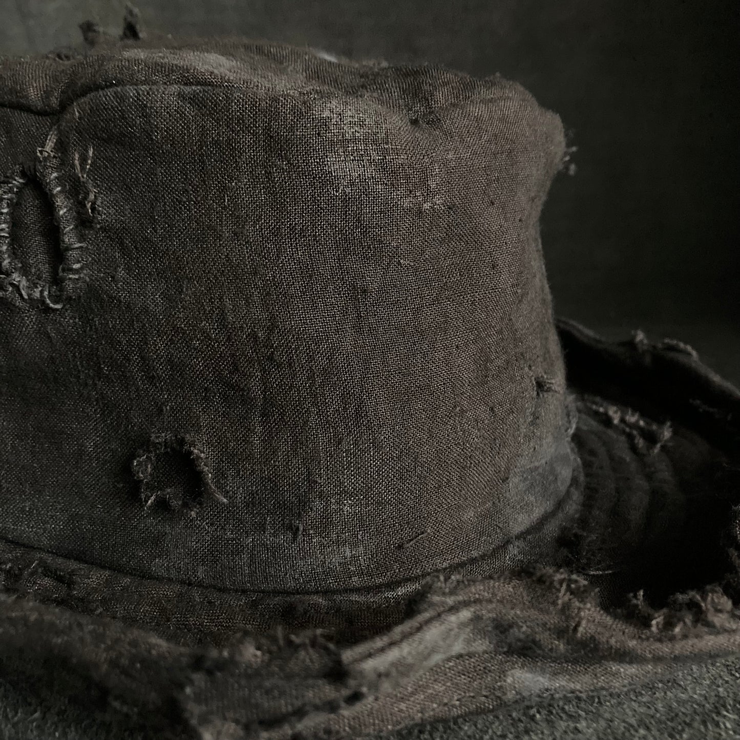 Thin black linen damage bucket hat