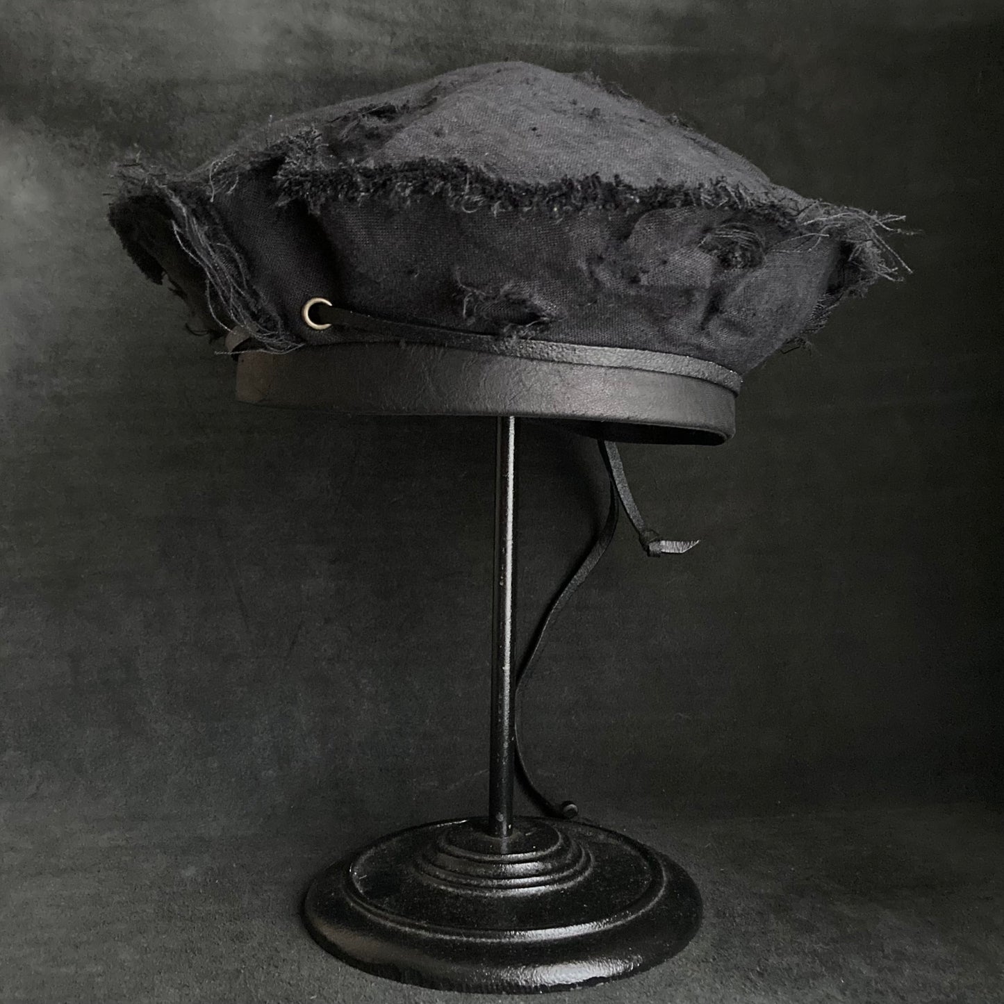 Back side black linen leather strap beret