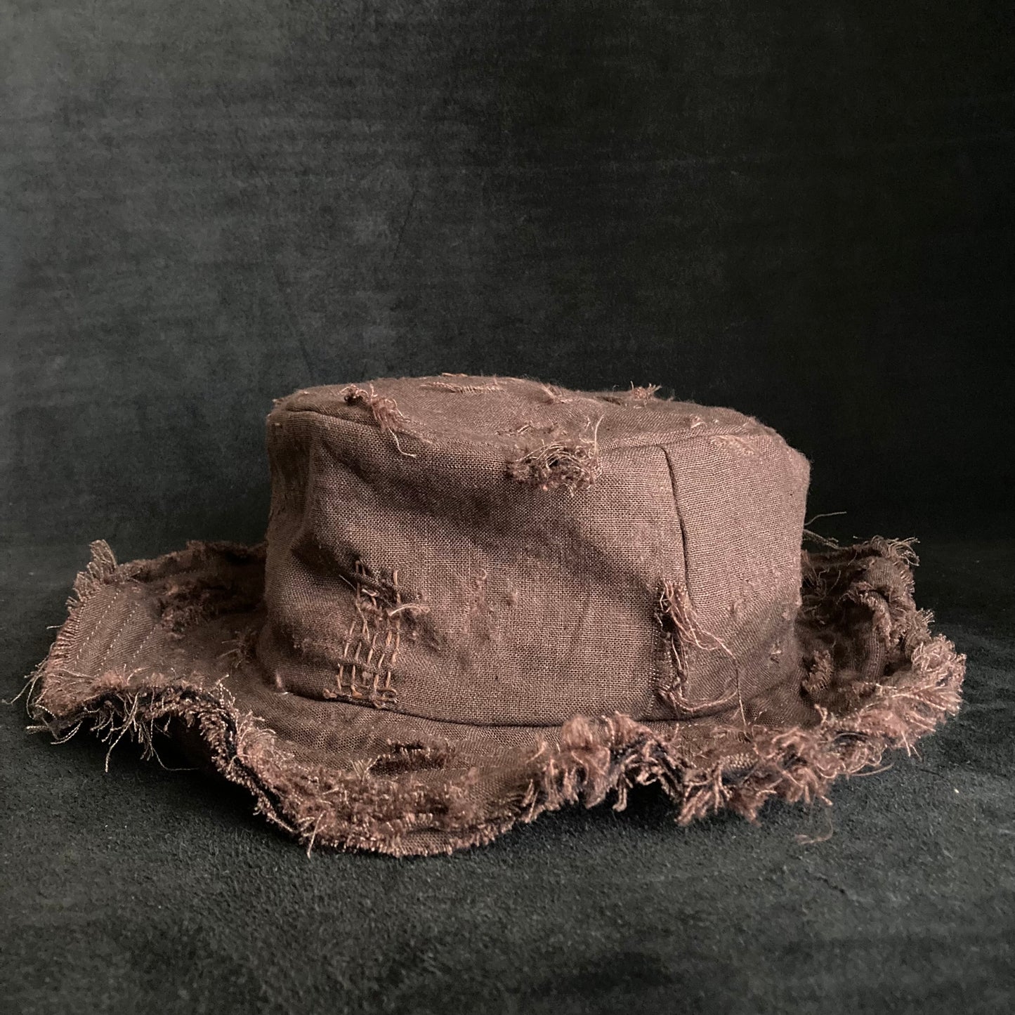 Brown linen damage stitch bucket hat