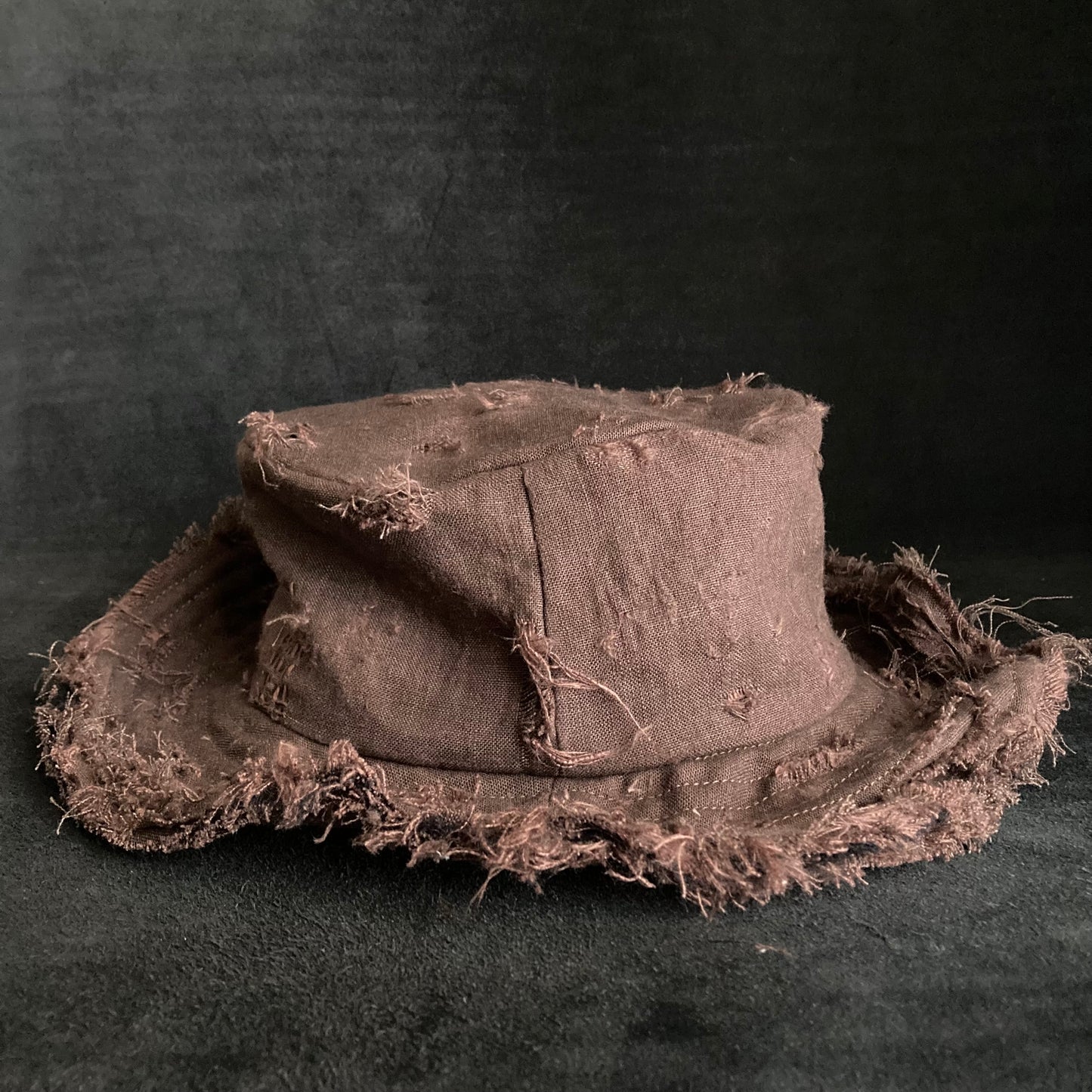 Brown linen damage stitch bucket hat