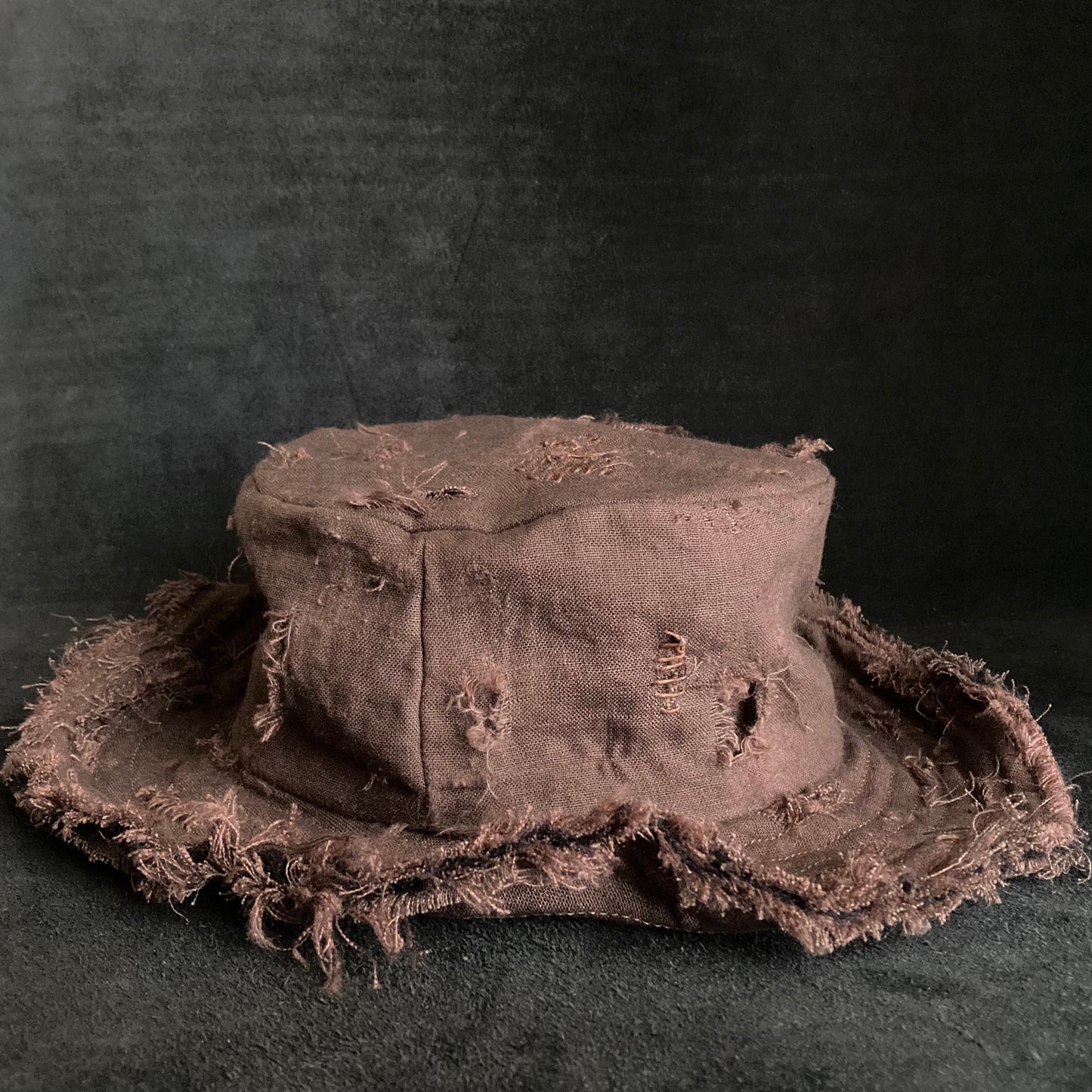 Brown linen damage stitch bucket hat