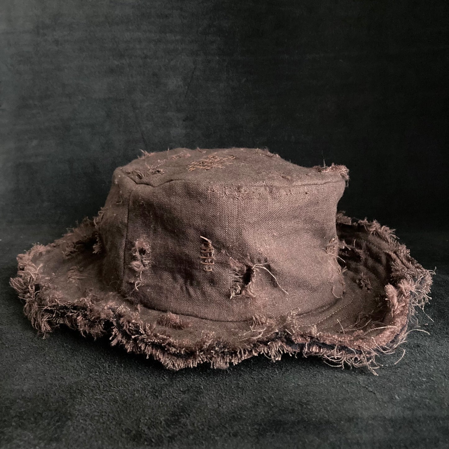 Brown linen damage stitch bucket hat