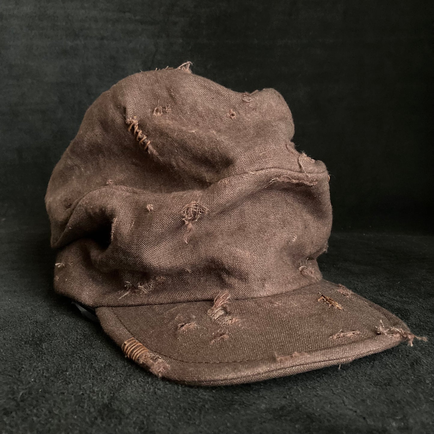 Brown linen damage turn cap (brim core)