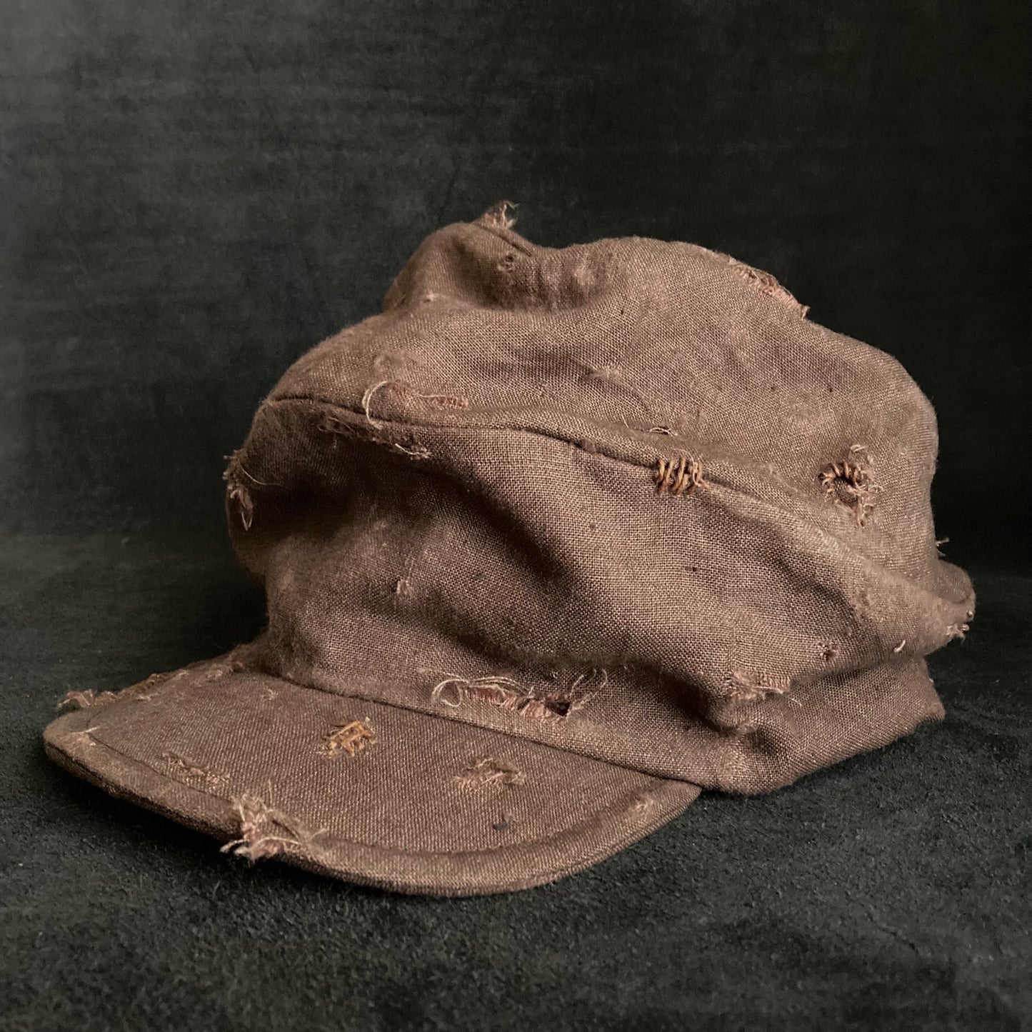 Brown linen damage turn cap (brim core)