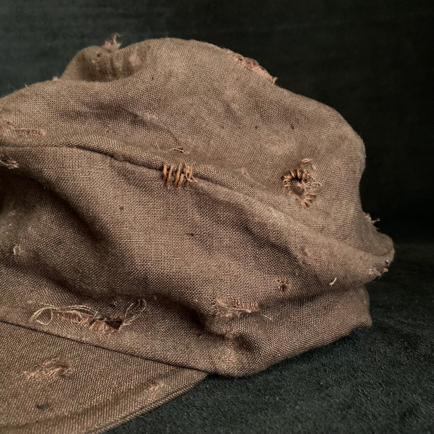 Brown linen damage turn cap (brim core)