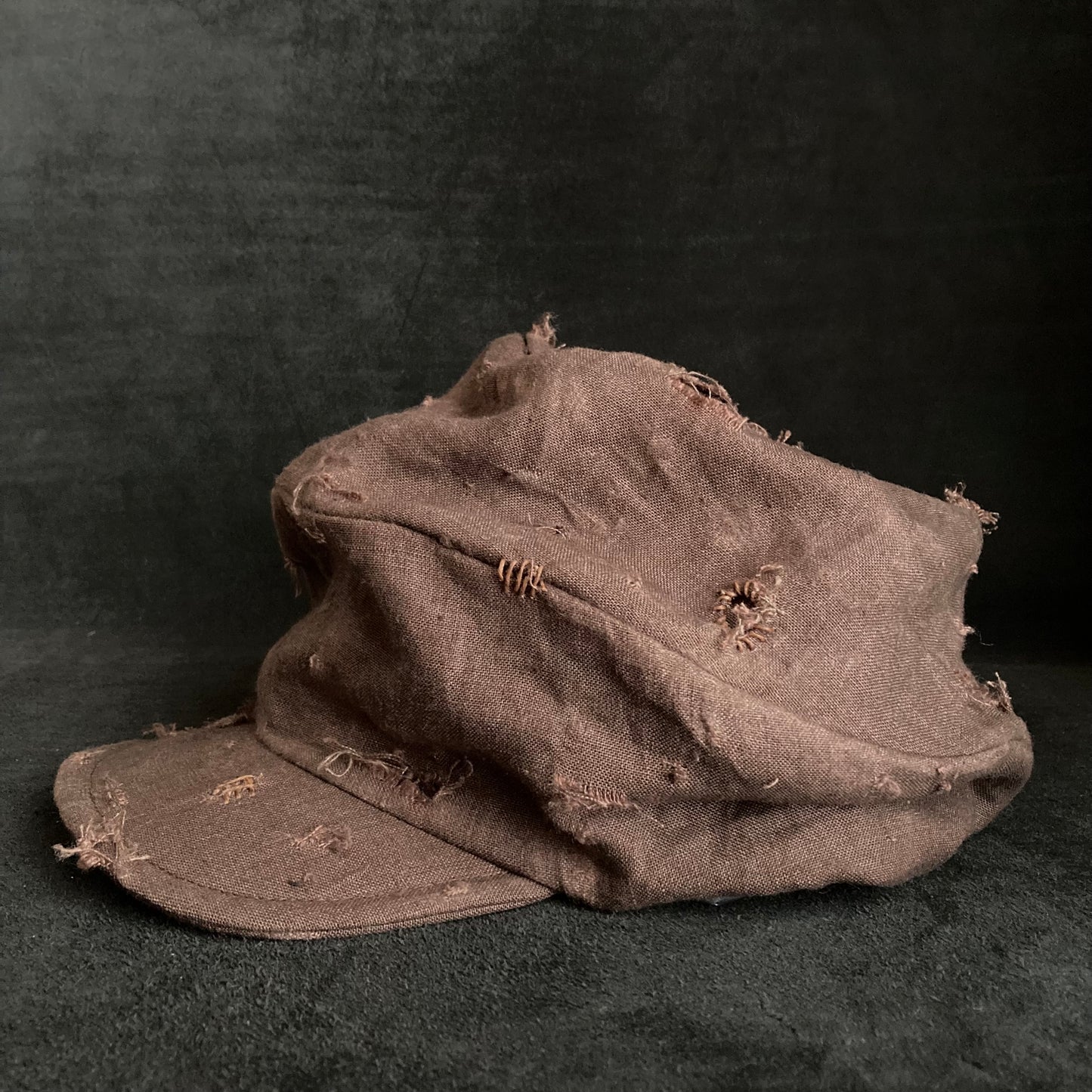 Brown linen damage turn cap (brim core)
