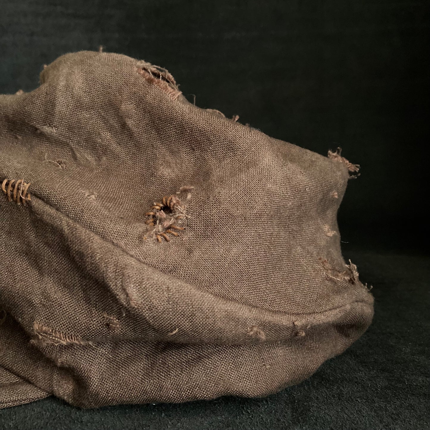 Brown linen damage turn cap (brim core)