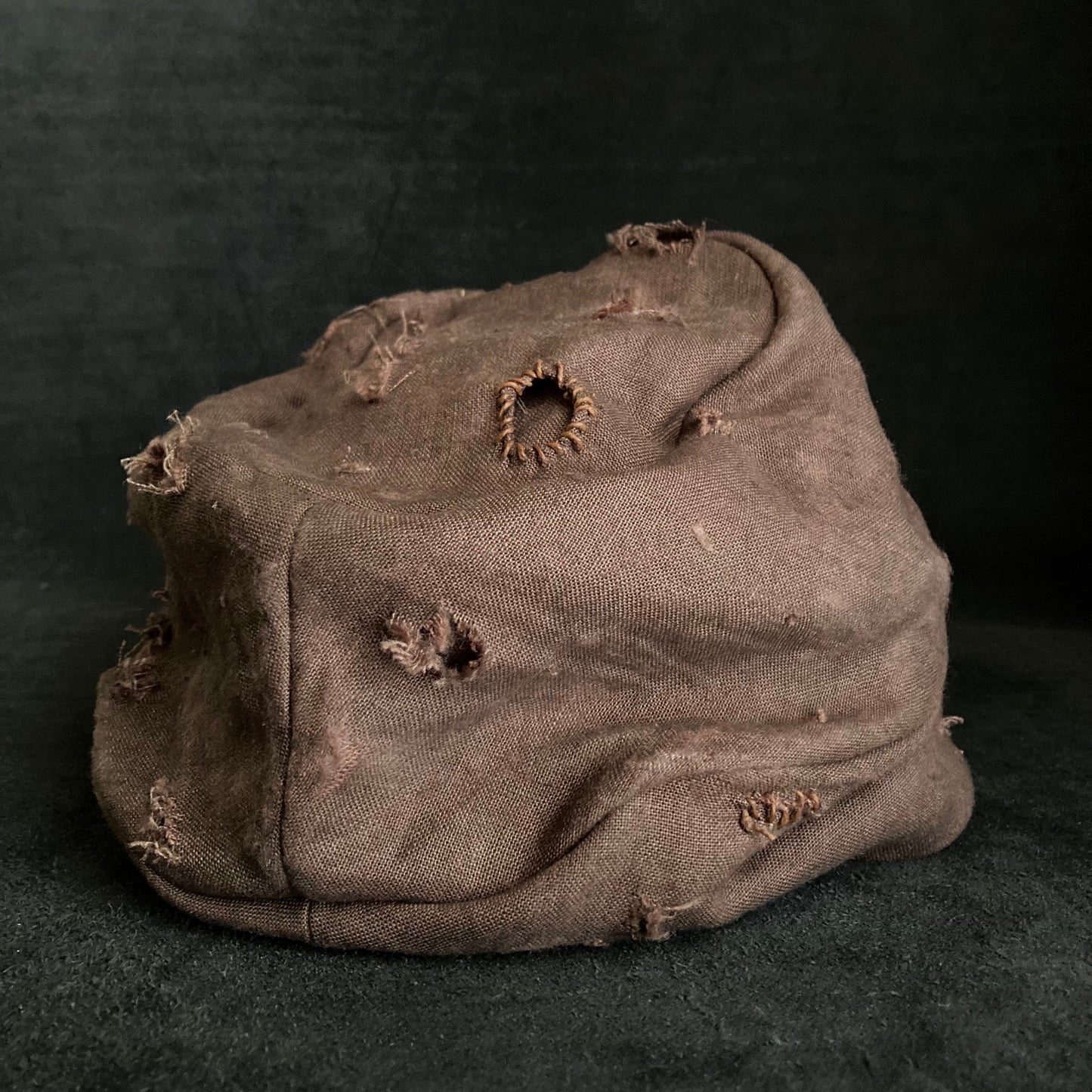 Brown linen damage turn cap (brim core)