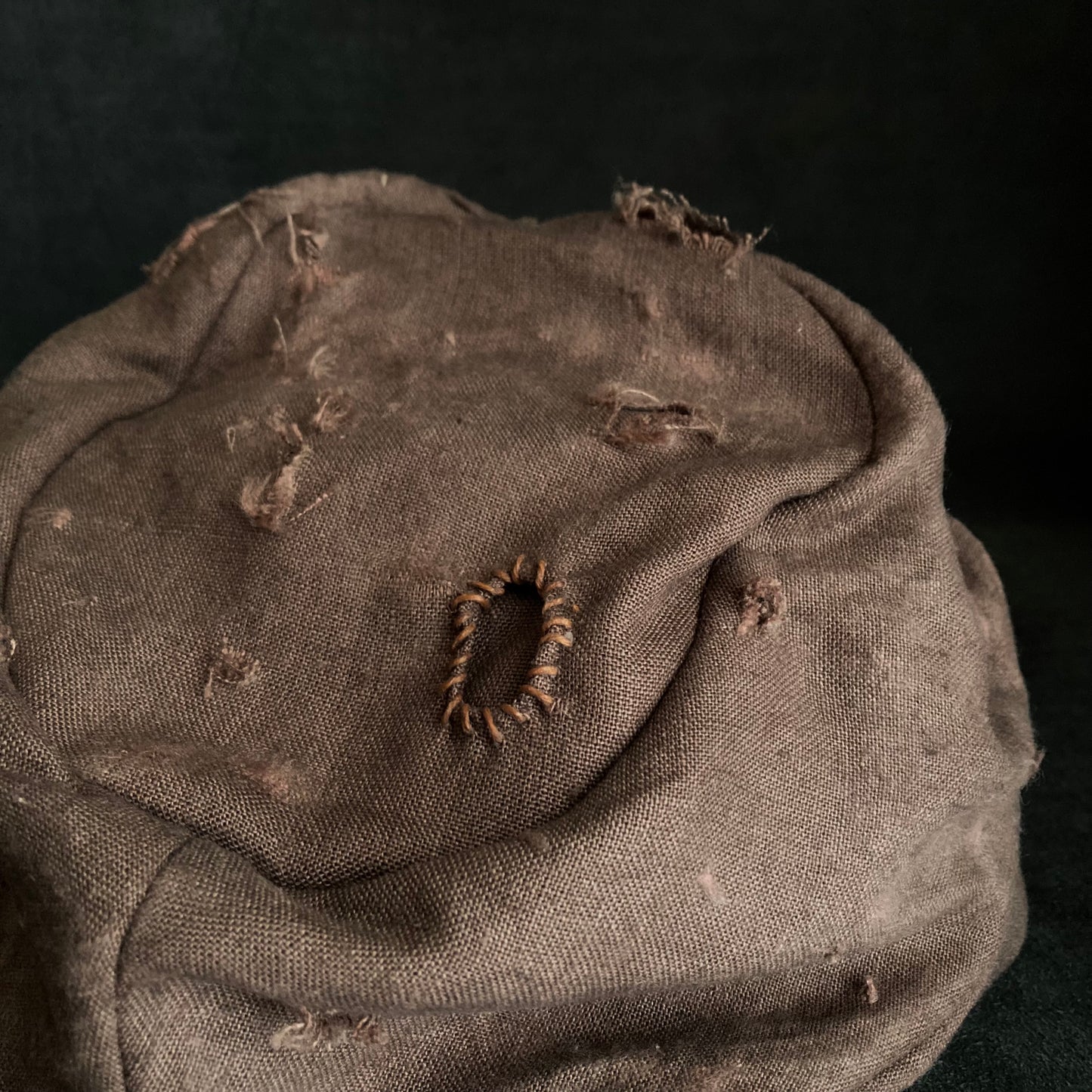 Brown linen damage turn cap (brim core)