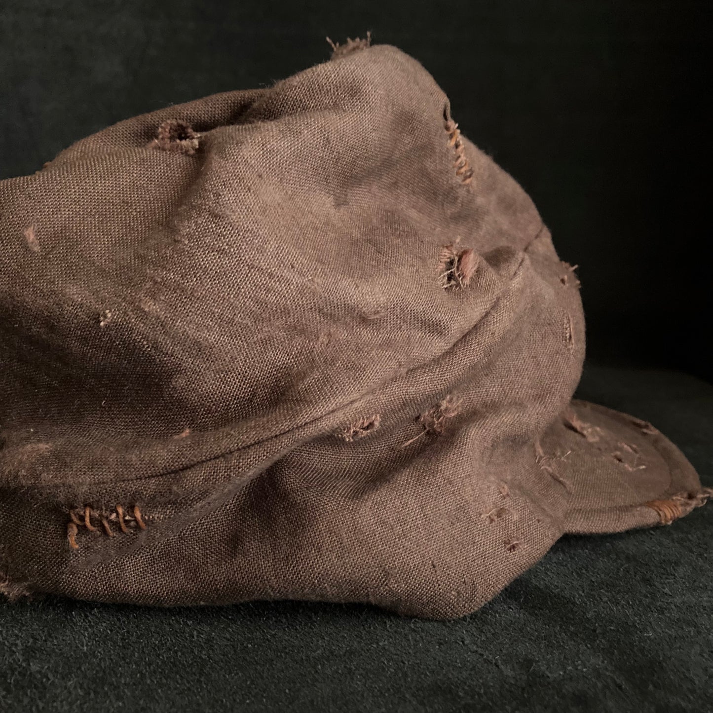 Brown linen damage turn cap (brim core)