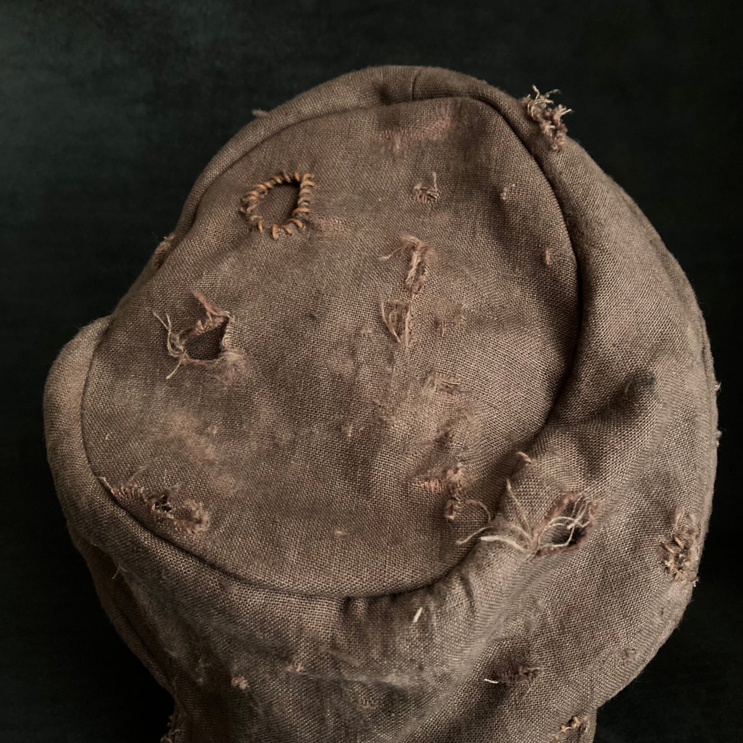 Brown linen damage turn cap (brim core)