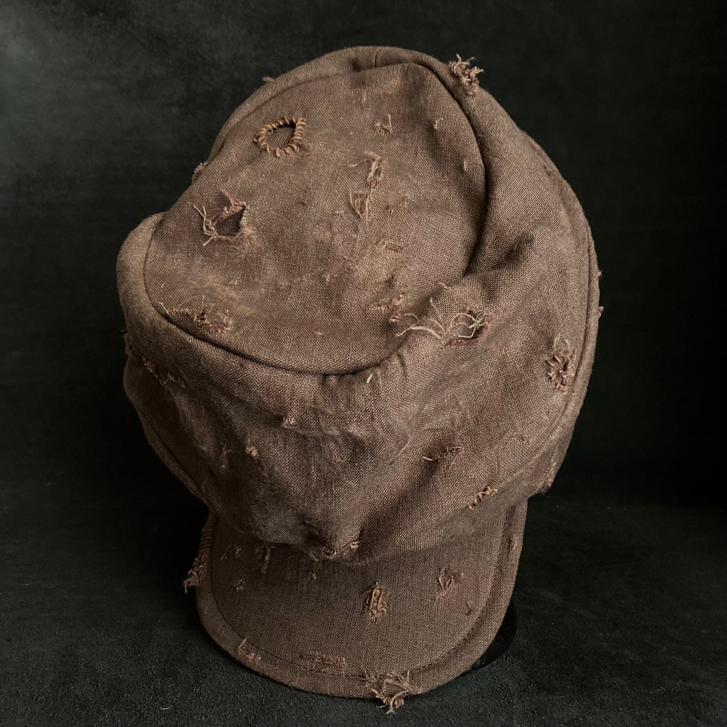 Brown linen damage turn cap (brim core)