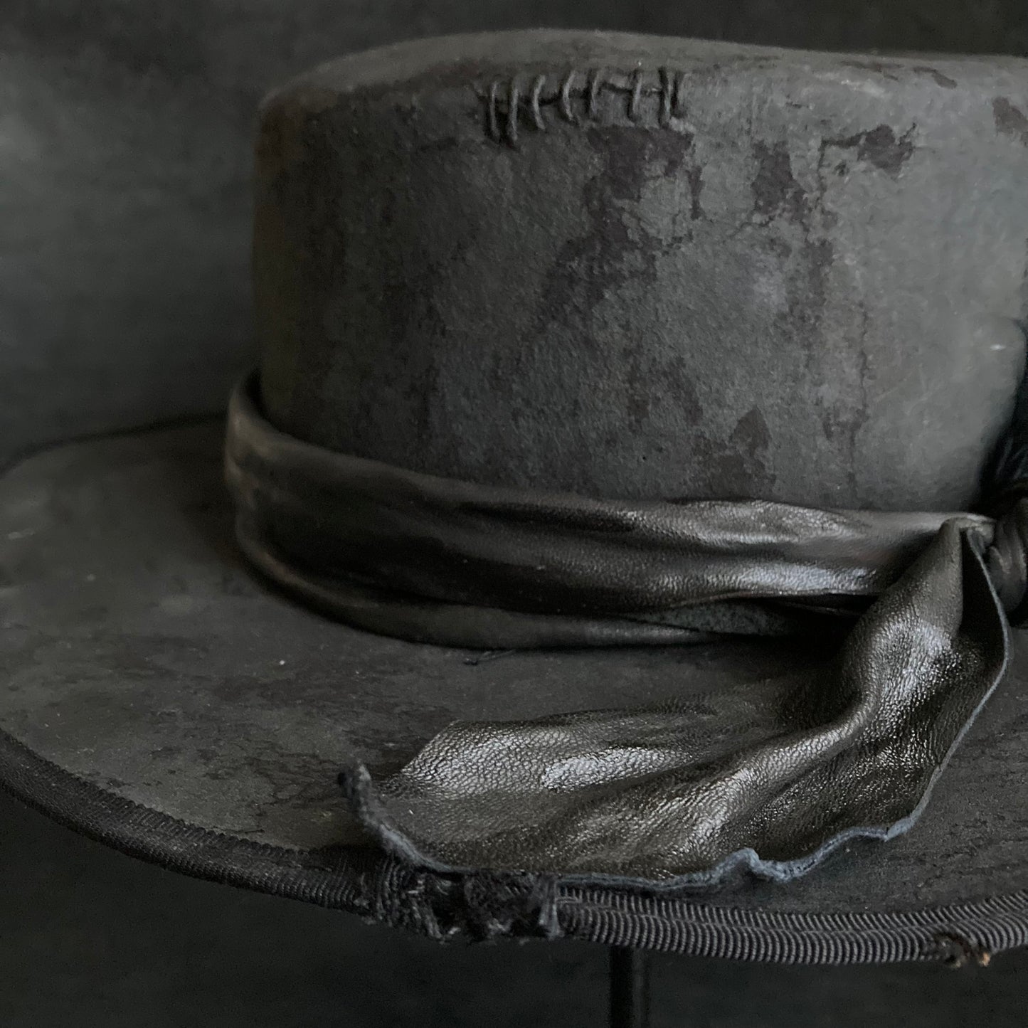 Charcoal crow damage flat hat