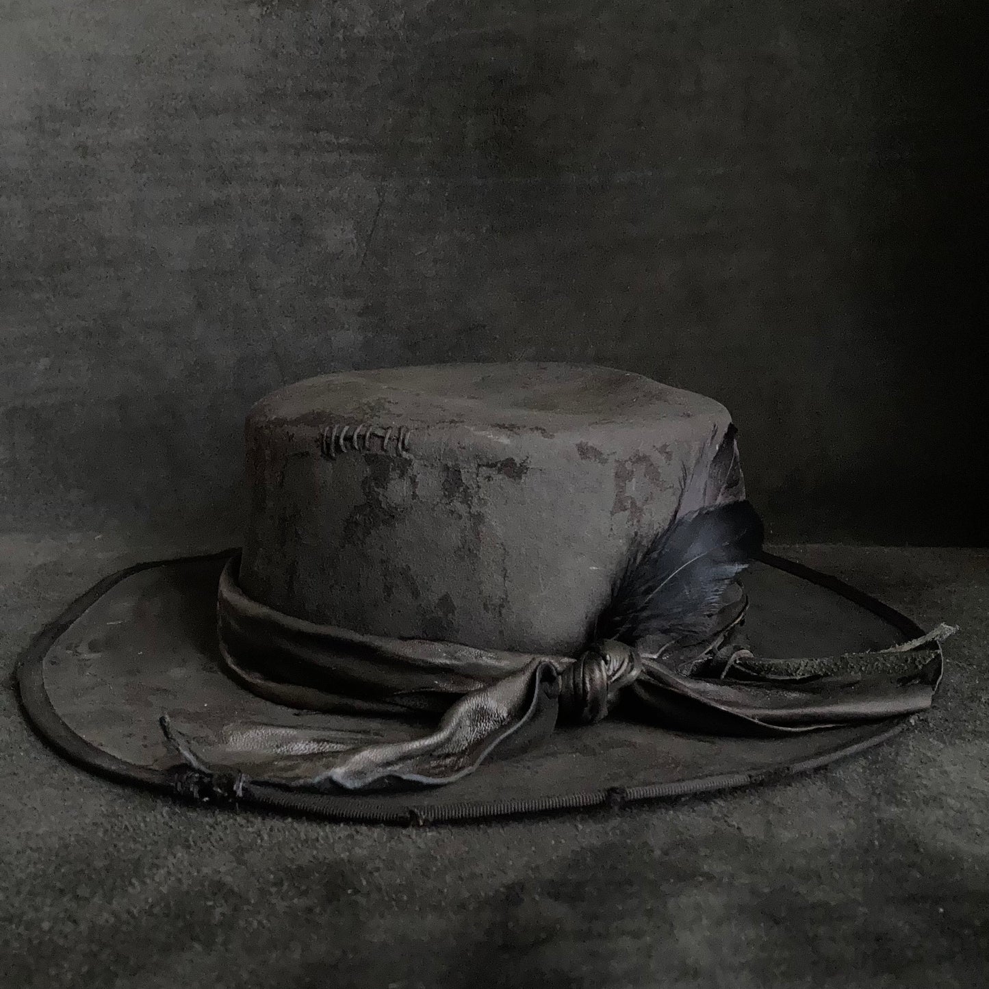 Charcoal crow damage flat hat