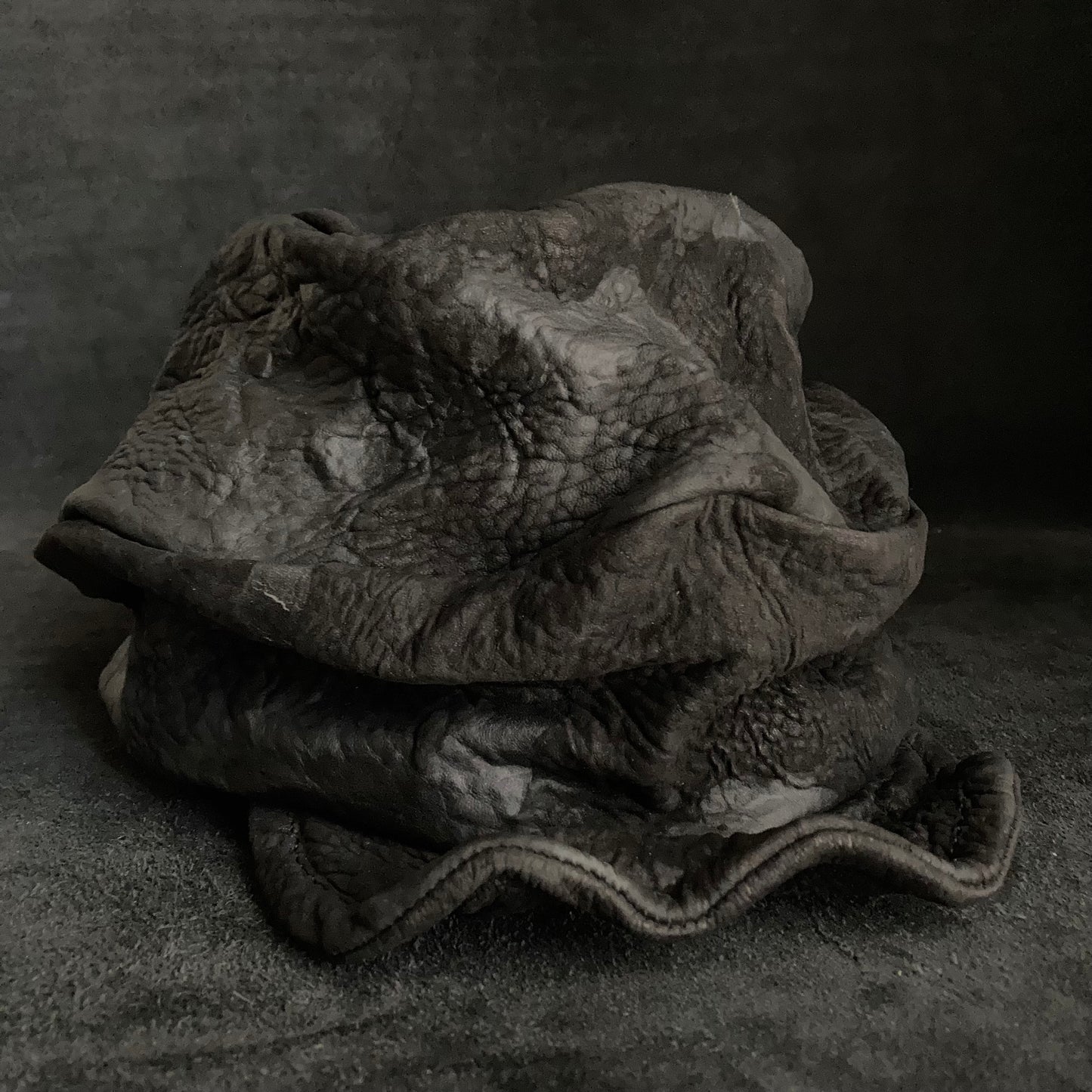 Grain sheepskin leather turn cap