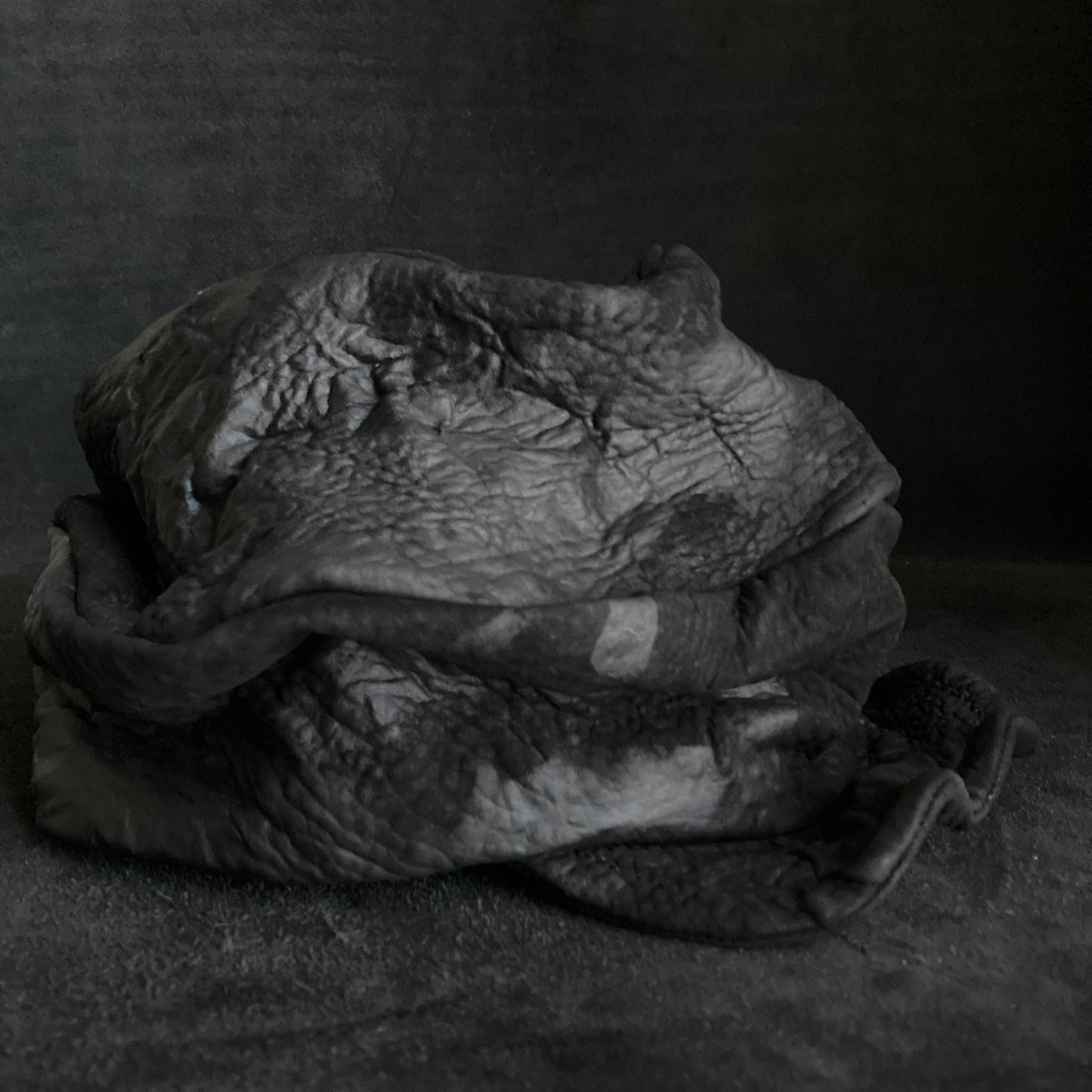 Grain sheepskin leather turn cap