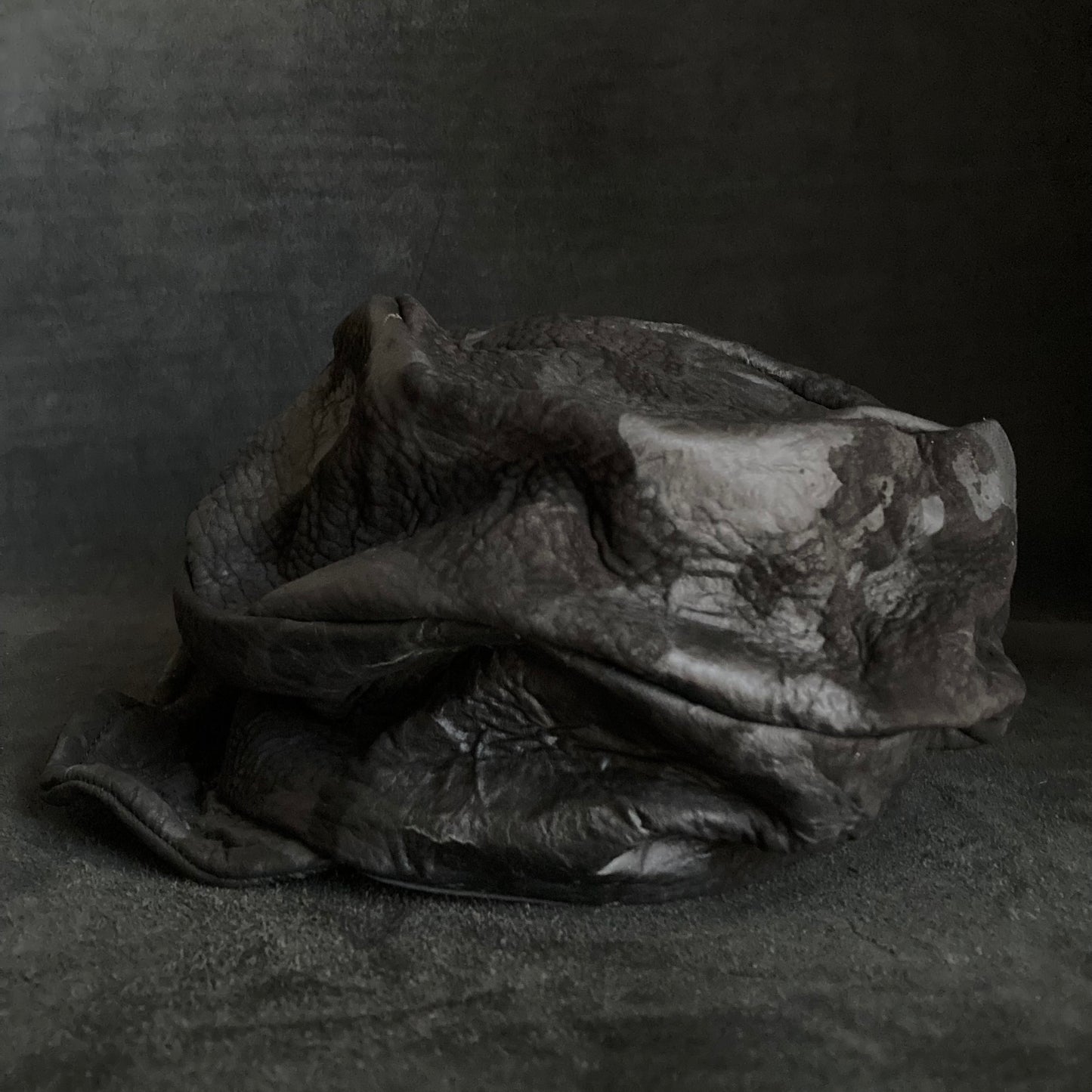 Grain sheepskin leather turn cap