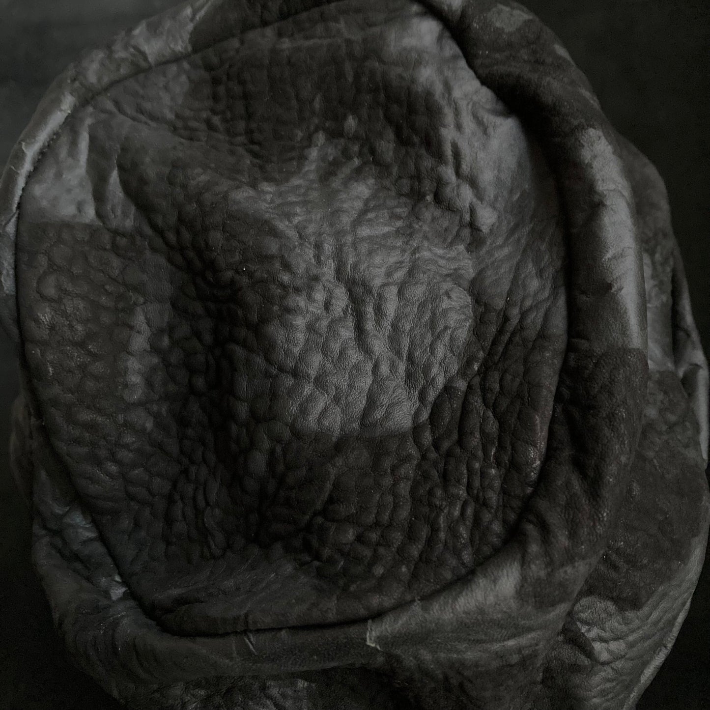 Grain sheepskin leather turn cap