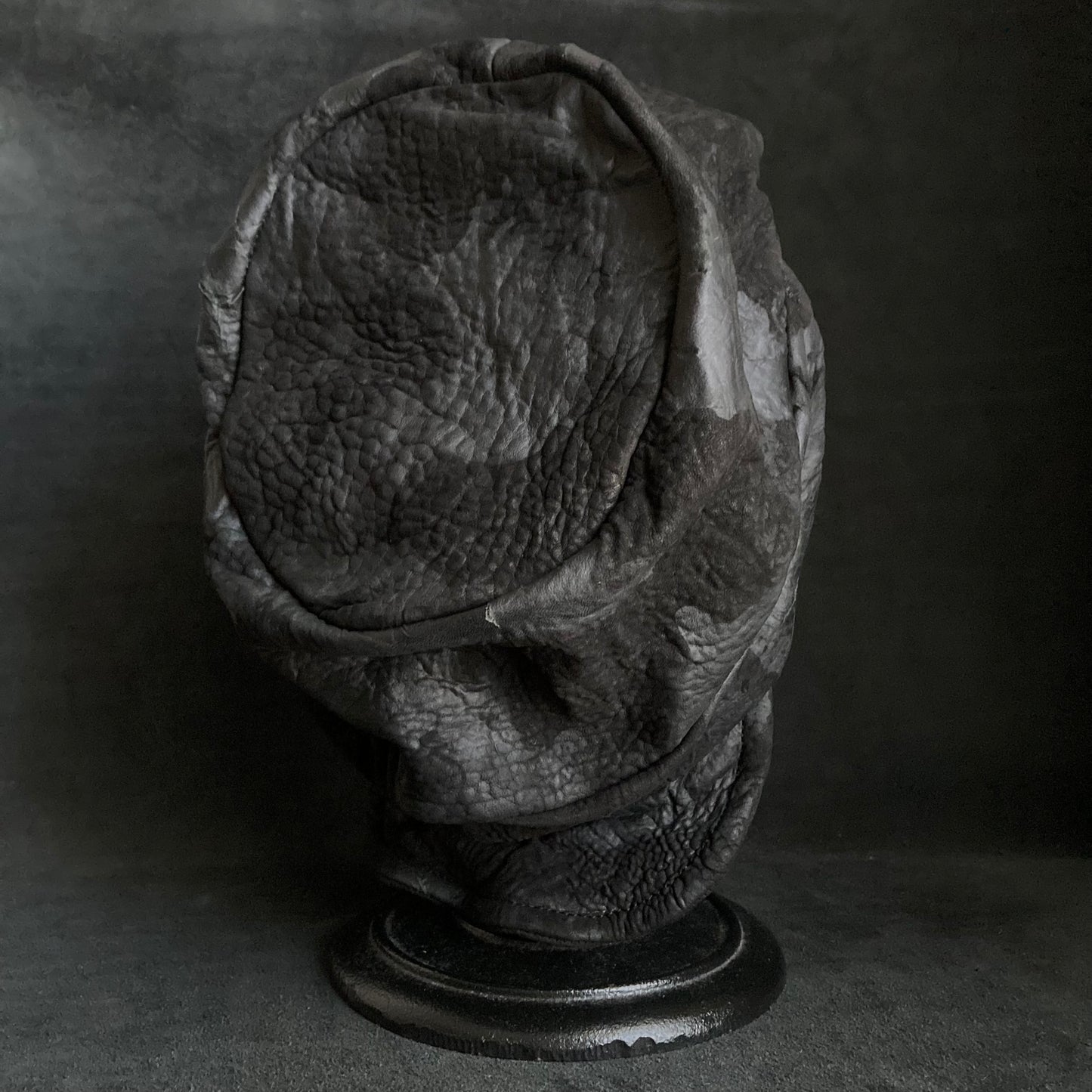 Grain sheepskin leather turn cap
