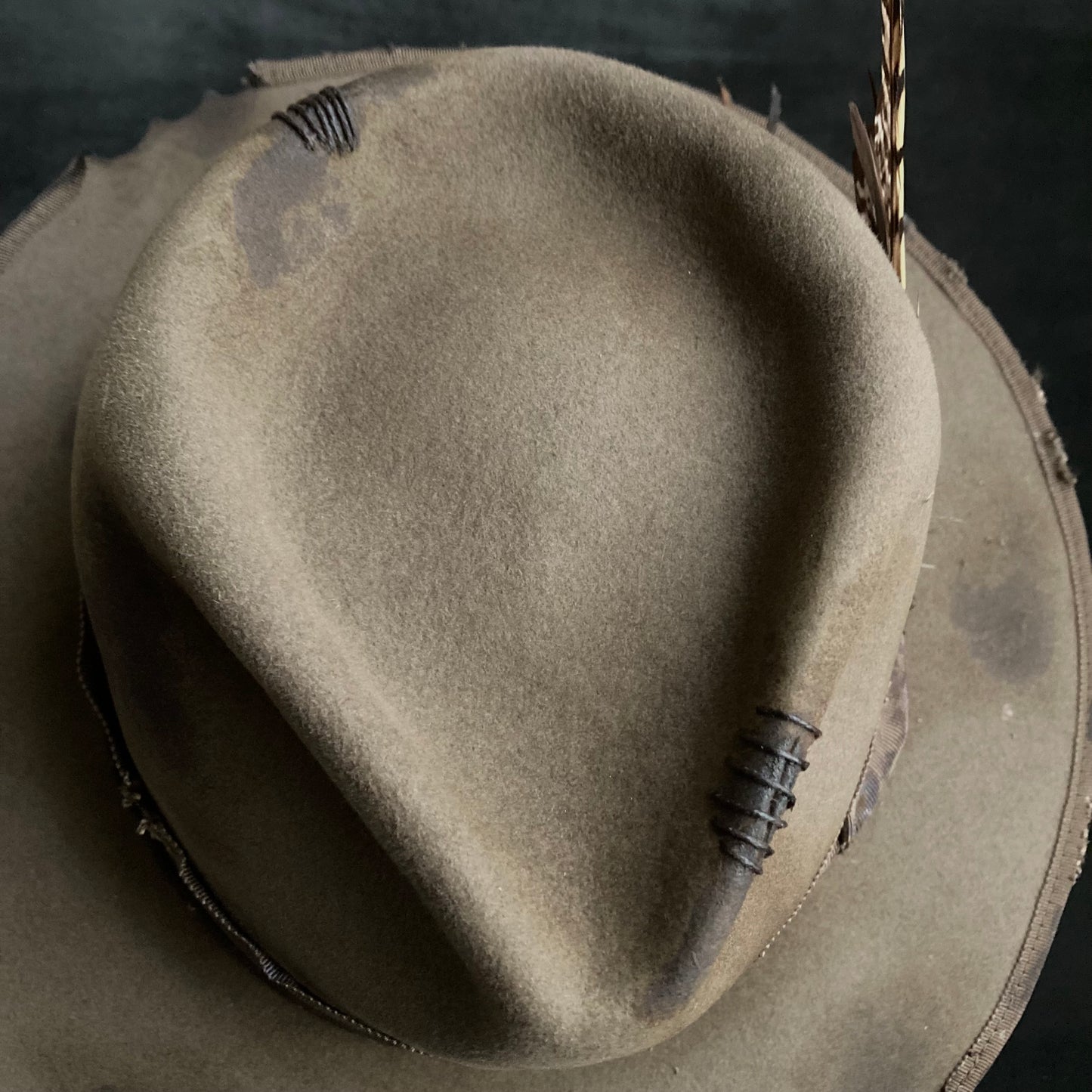 Feel feathers damage fedora hat