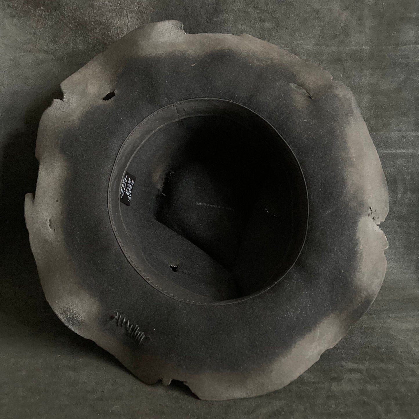 Charcoal eyelet destruction hat