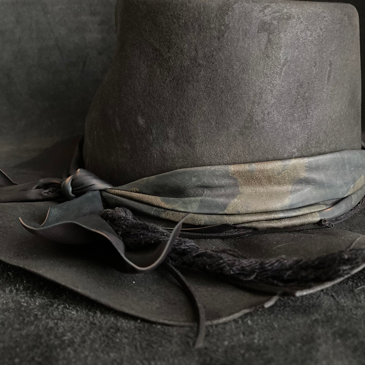 Charcoal mottled leather dull fedora hat