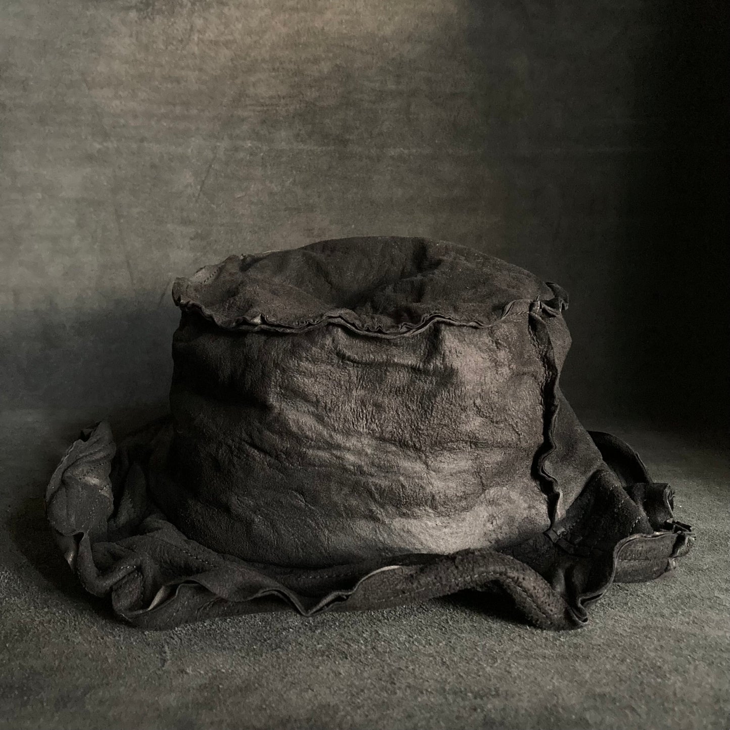 Bleach wash crumpled black leather bucket