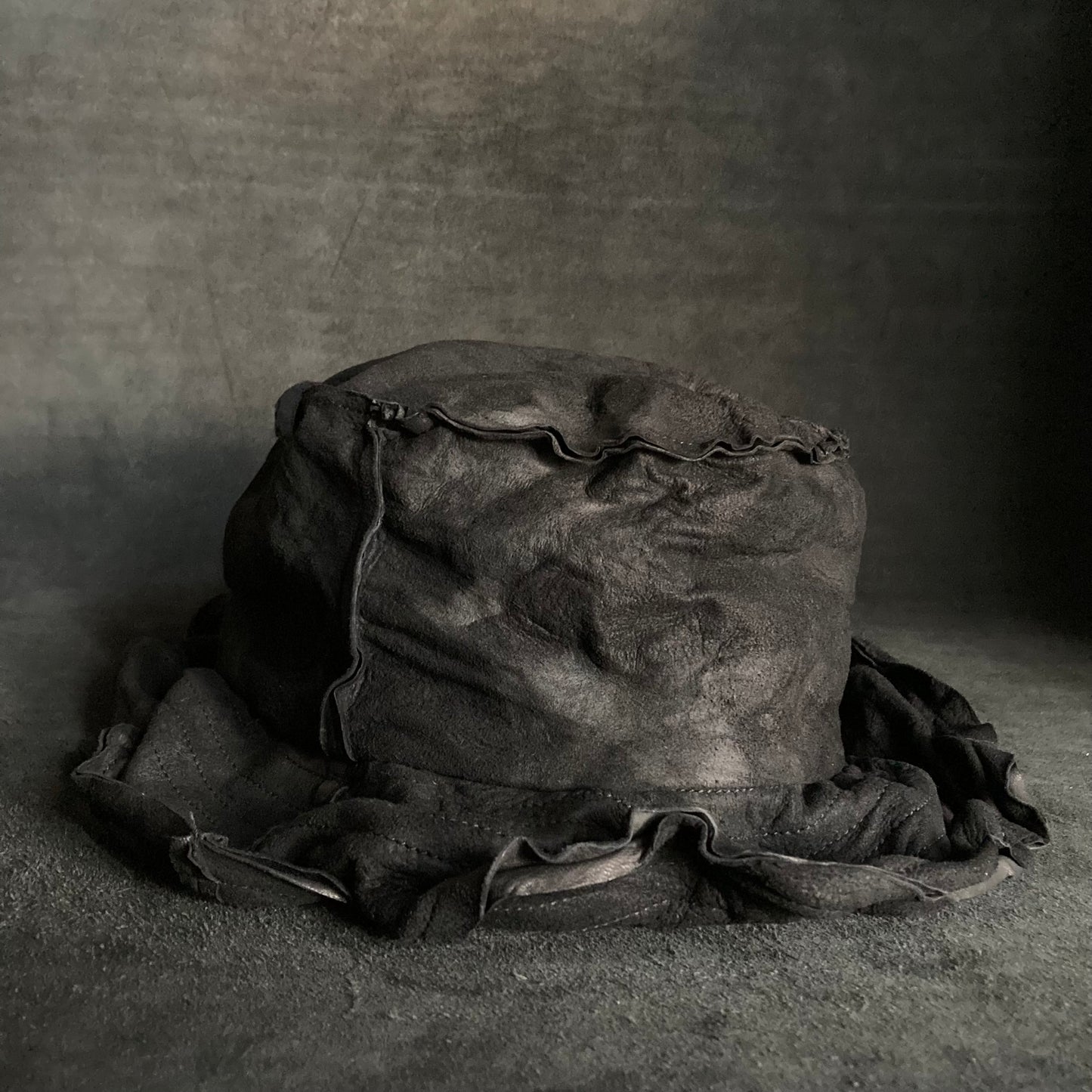 Bleach wash crumpled black leather bucket