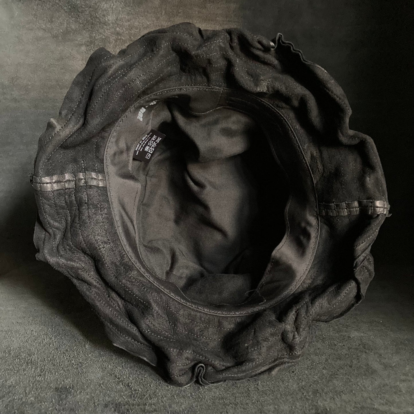 Bleach wash crumpled black leather bucket