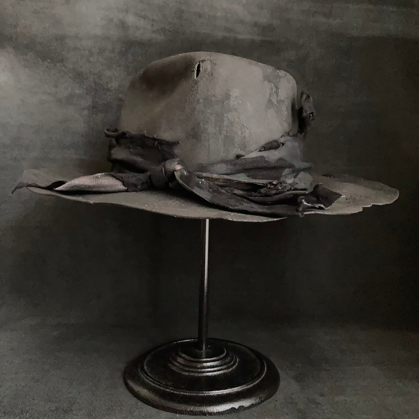 Charcoal tattered leather wide brim fedora hat