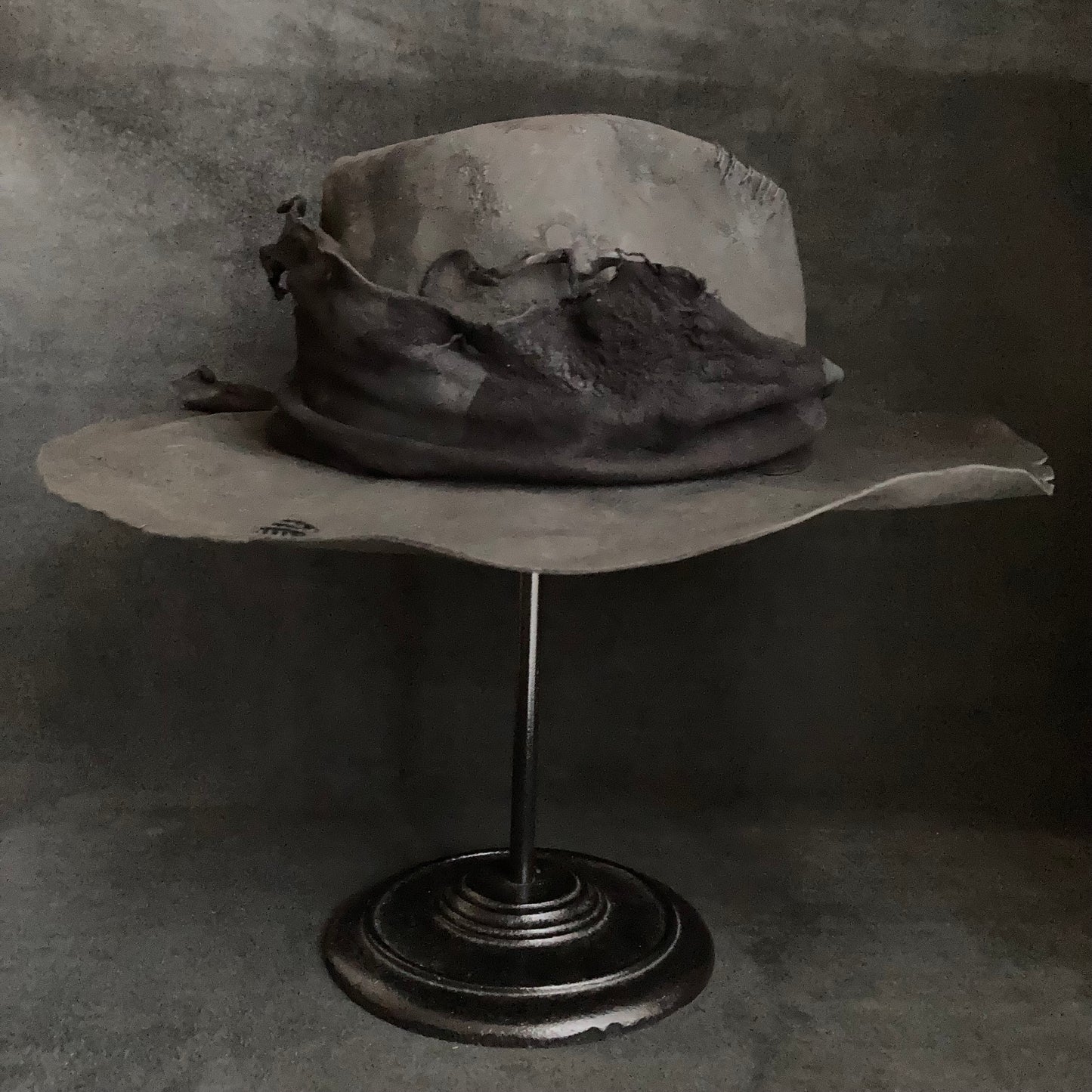 Charcoal tattered leather wide brim fedora hat