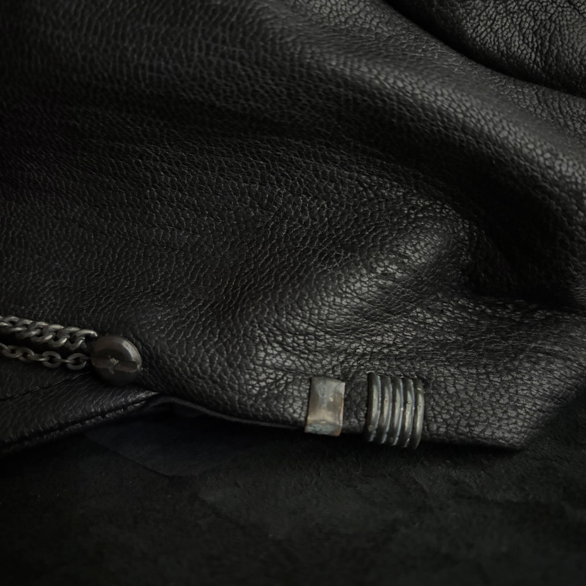 Grit black leather turn cap