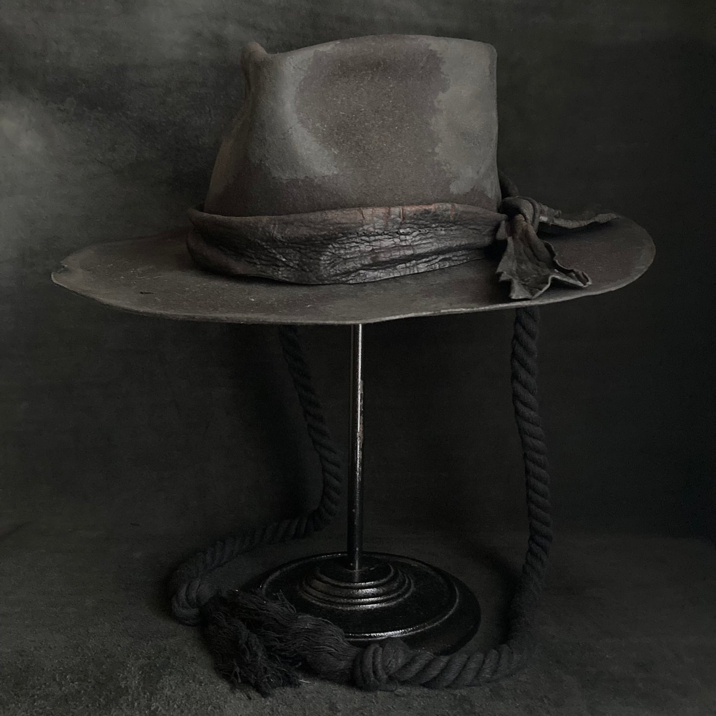 Burned black fedora hanging rope hat