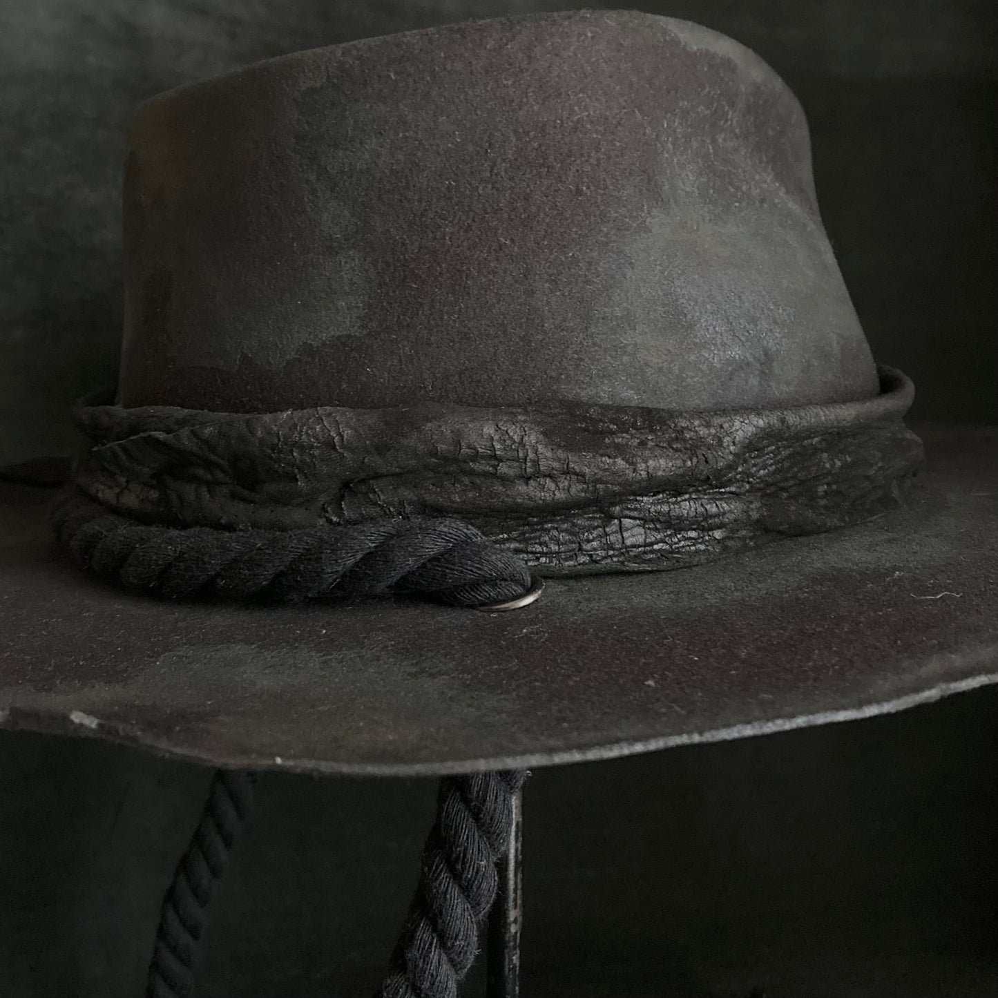 Burned black fedora hanging rope hat