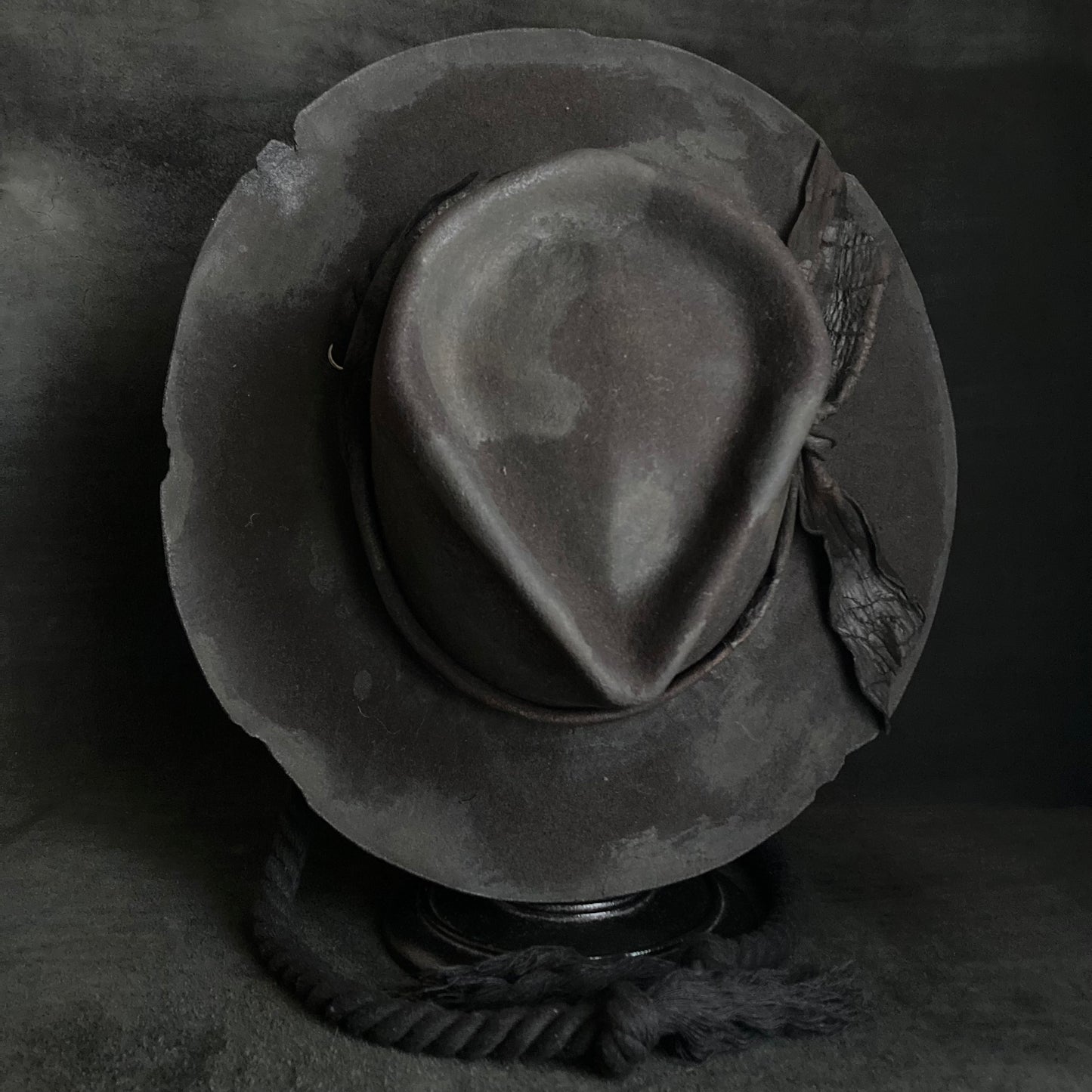 Burned black fedora hanging rope hat
