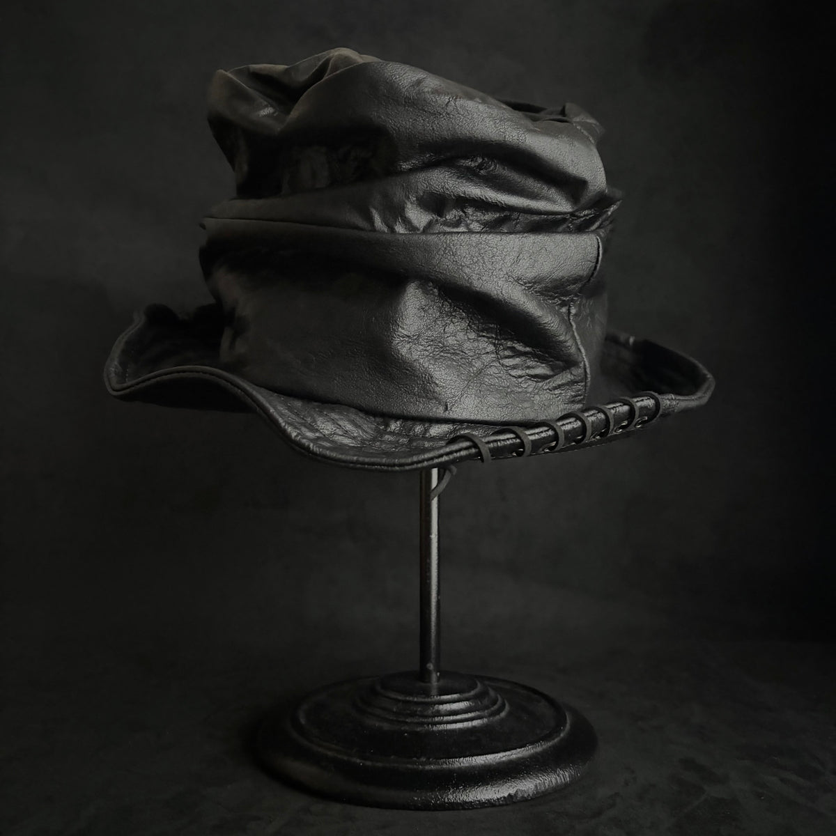 Dense black leather turn bucket hat