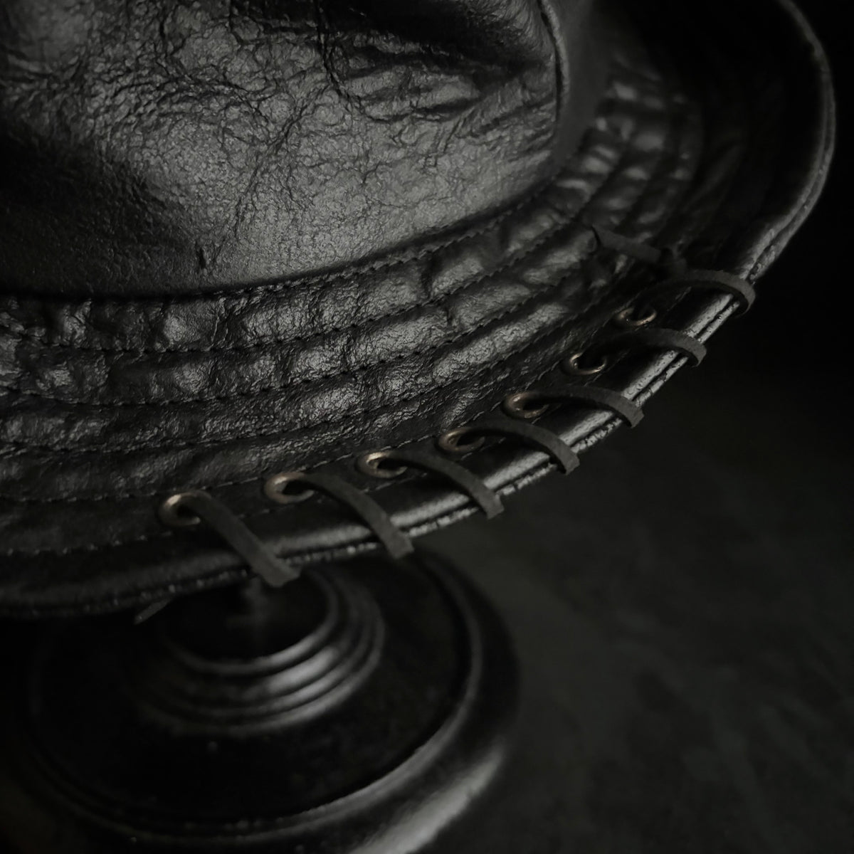 Dense black leather turn bucket hat